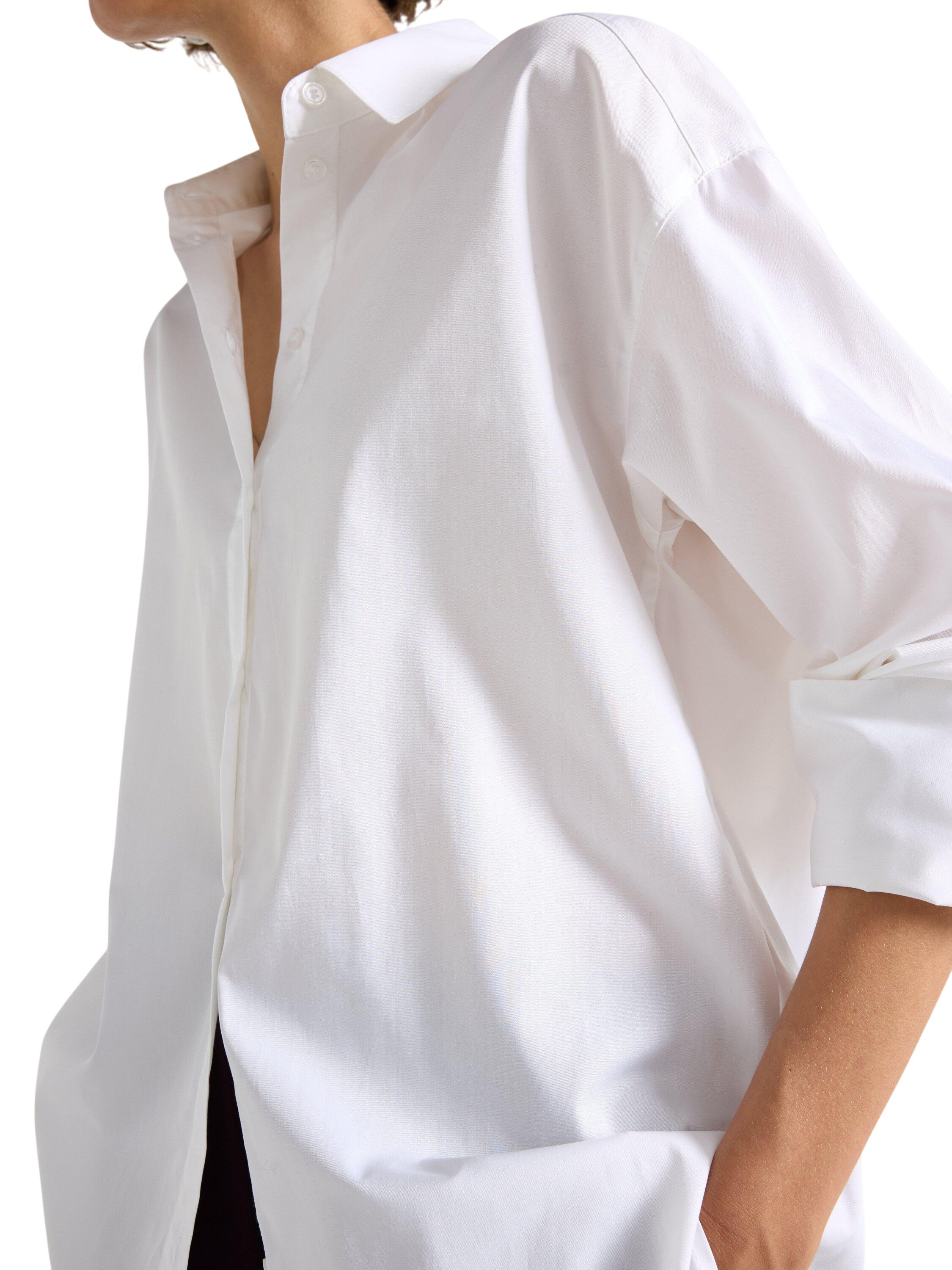 Lang&aelig;rmet skjorte i v&aelig;vet materia