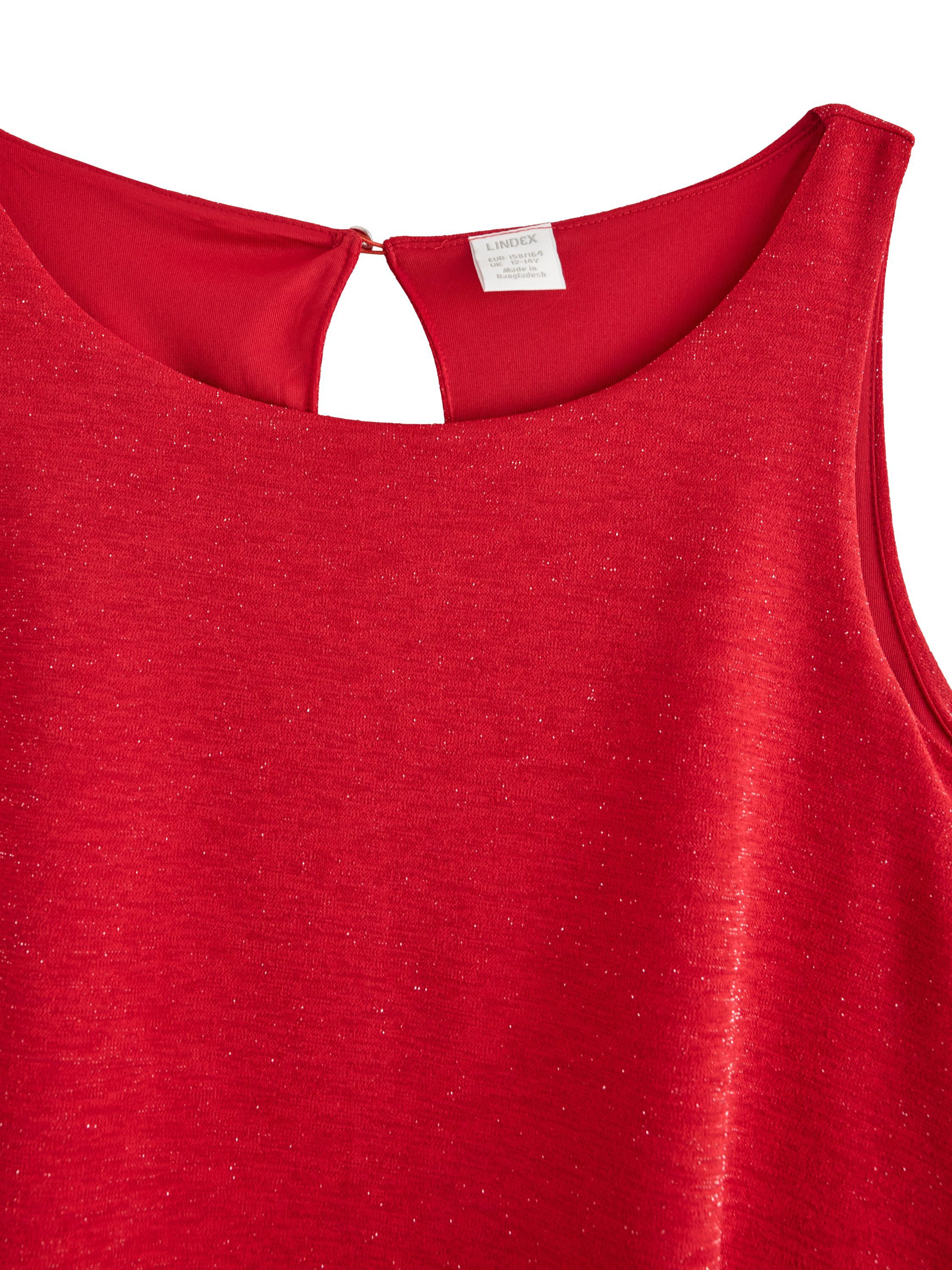 Glitrende, &aelig;rmel&oslash;s buksedragt med b