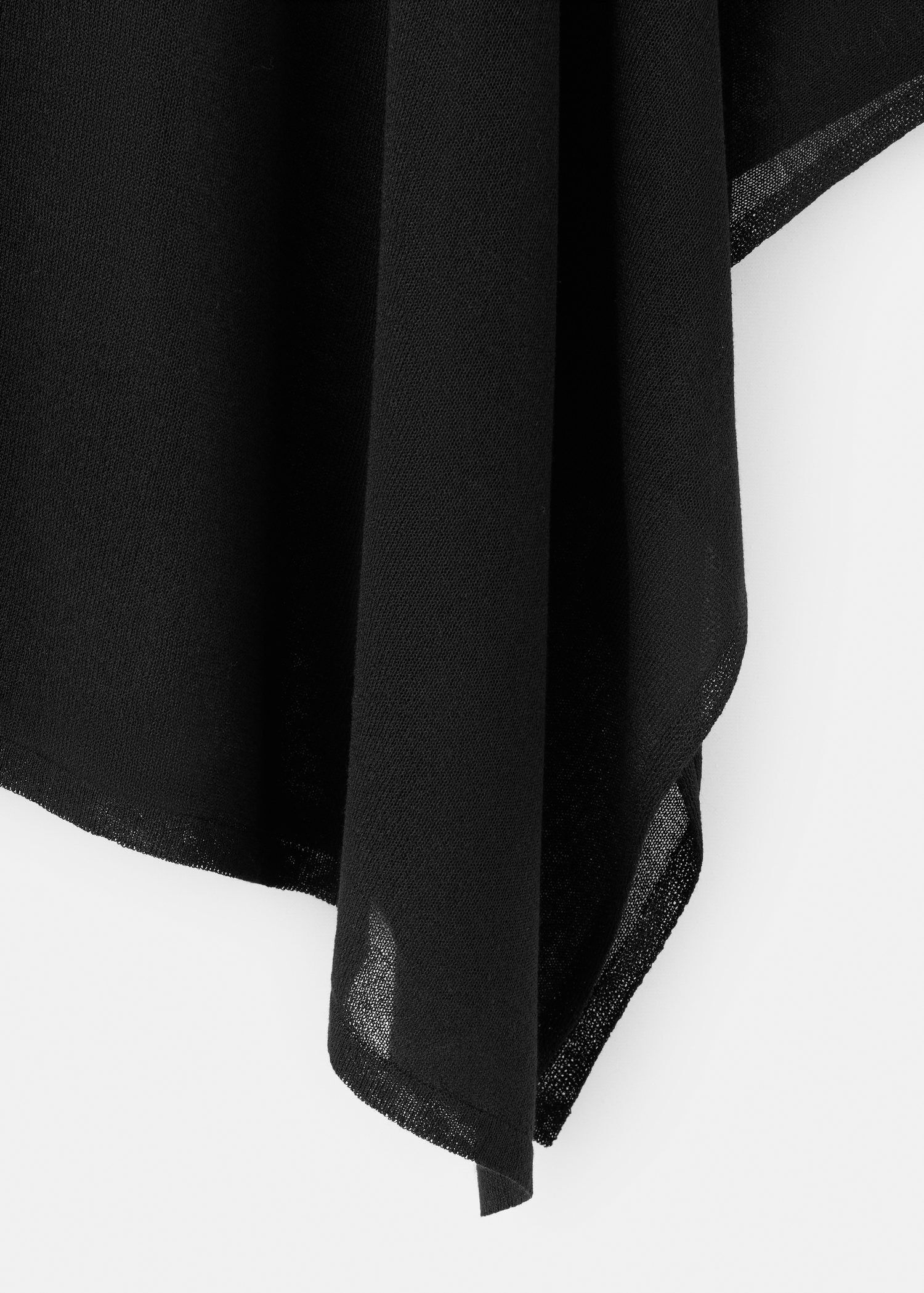 Asymmetrical knitted cape