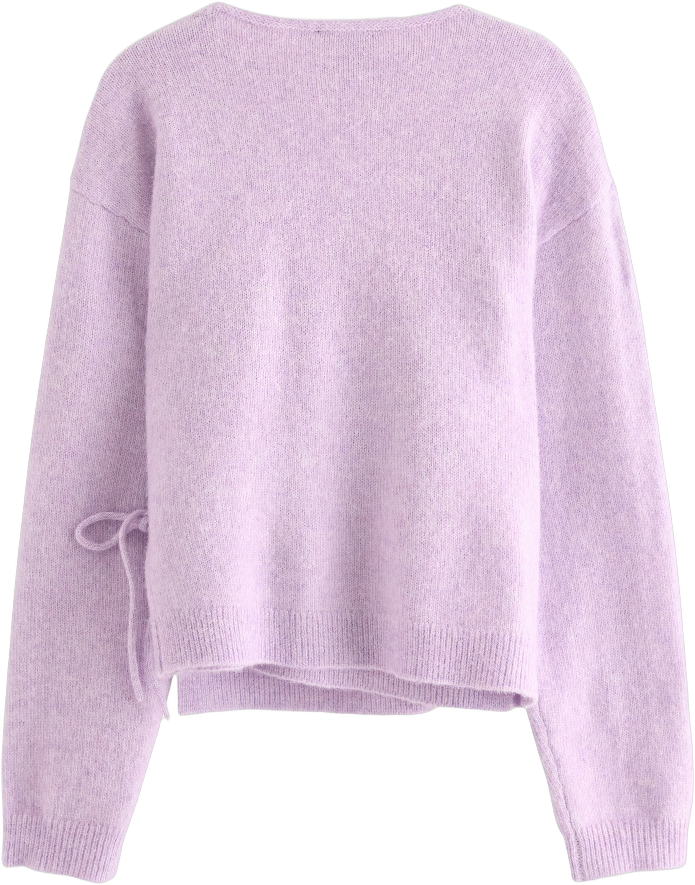 Myk, strikket sl&aring;-om-kofte med bind