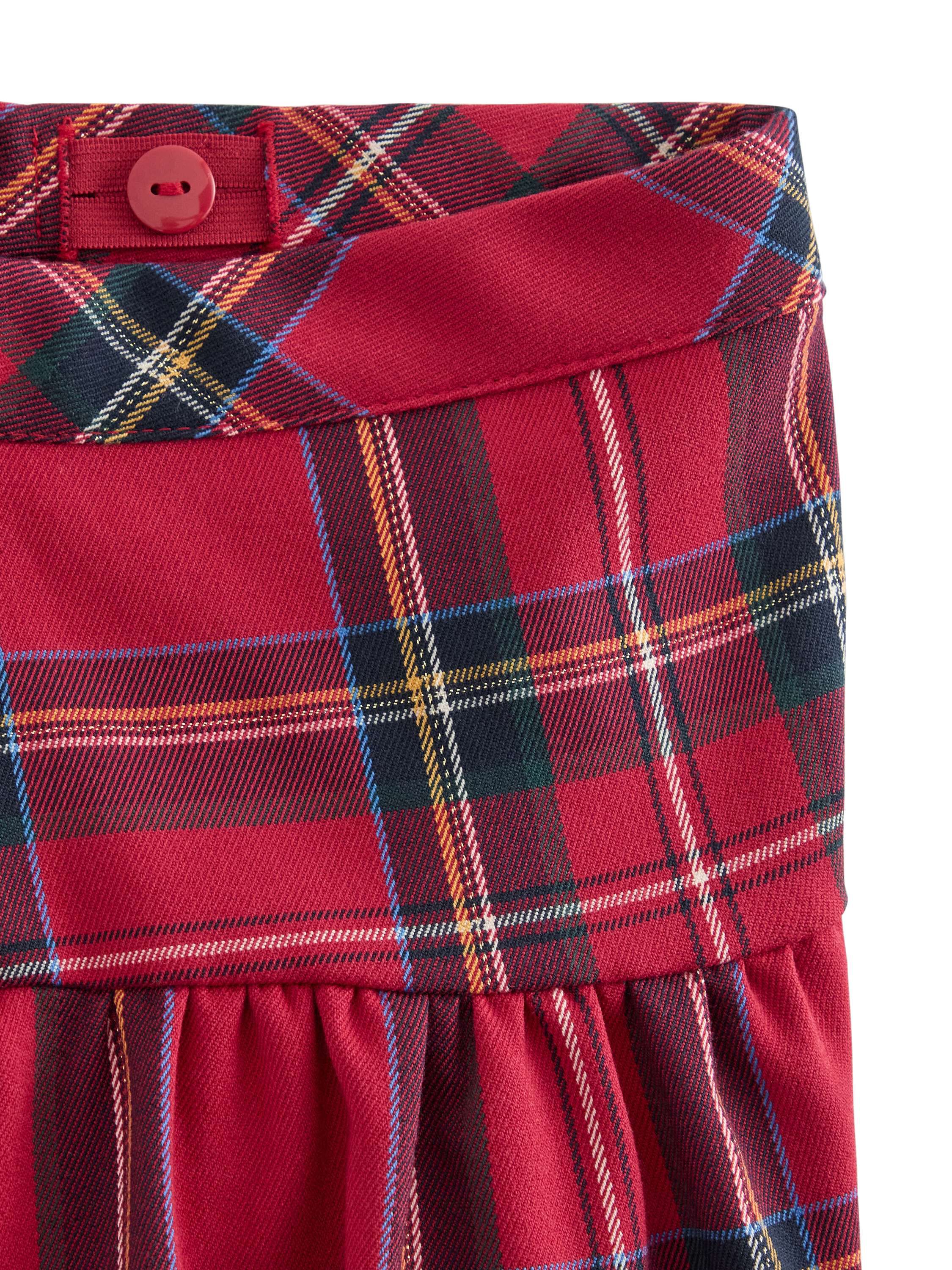 Rutig kjol med res&aring;r i midjan och d