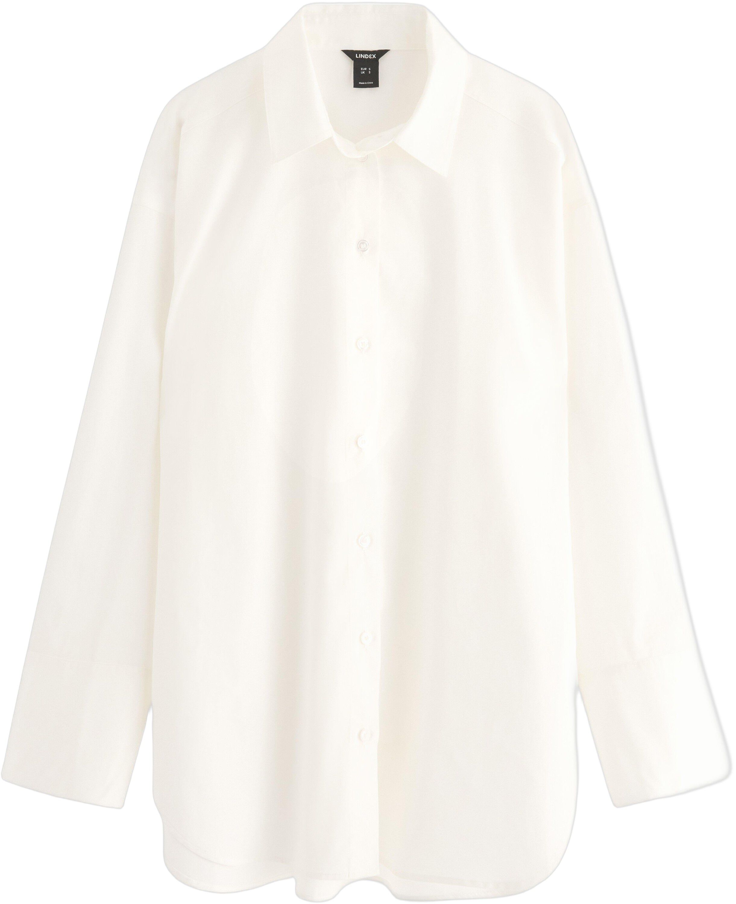 Lang&aelig;rmet skjorte i v&aelig;vet materia