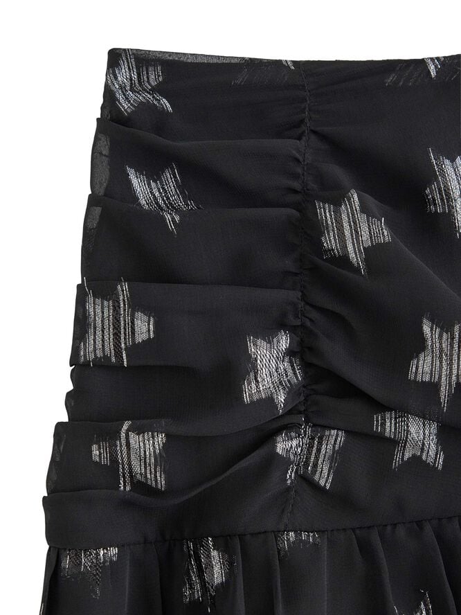 Lett skjørt i chiffong med stjerner