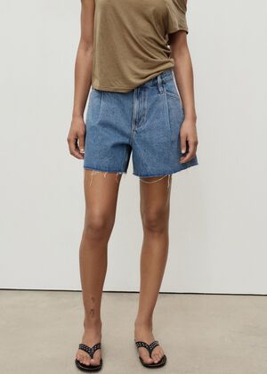 Denim shorts with frayed hem and pl