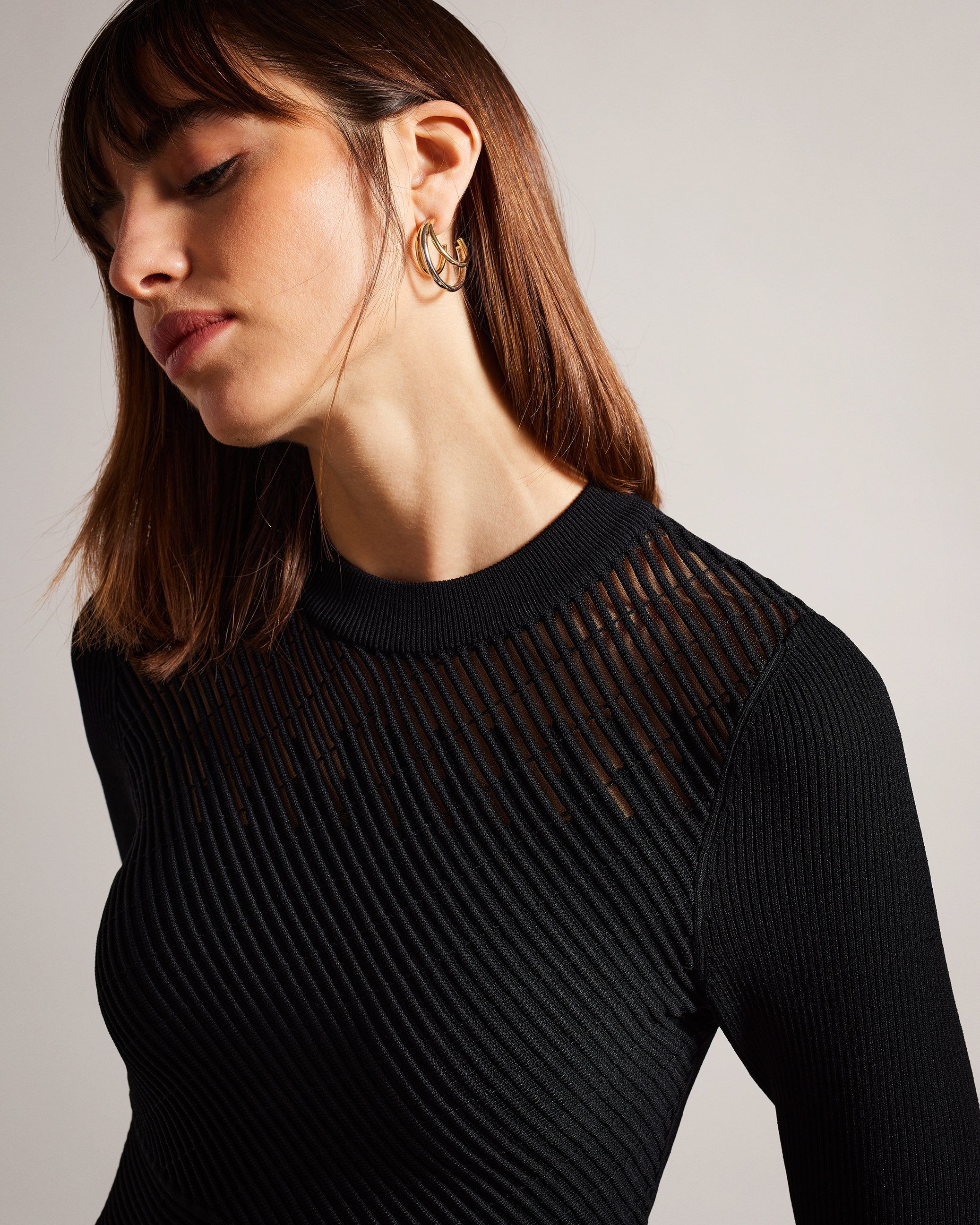 LATINIA Long Sleeve Knitted Ottoman