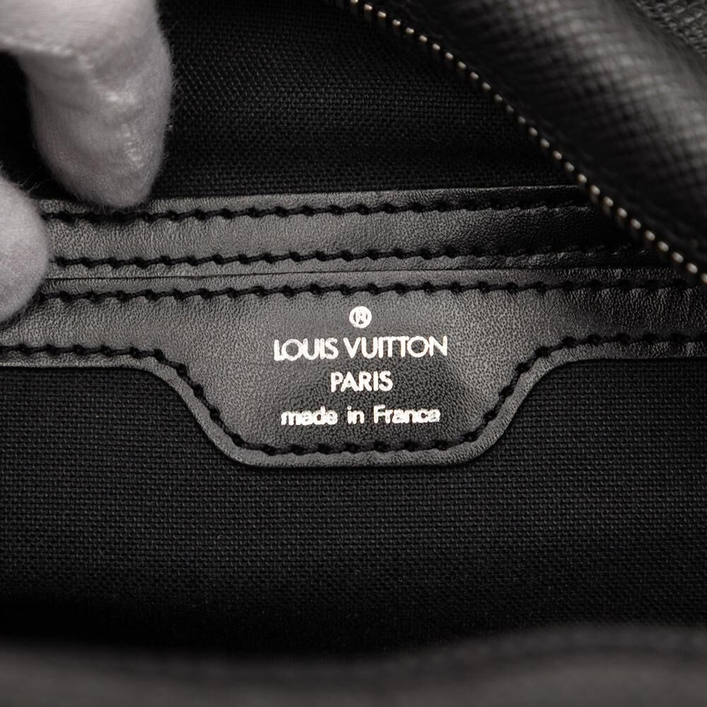 Louis Vuitton Reporter