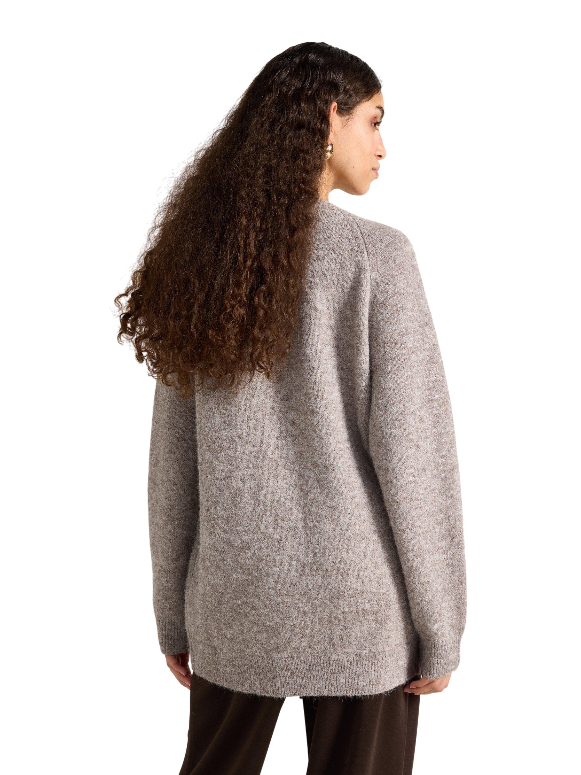 Strikket cardigan med en lidt l&aelig;nge