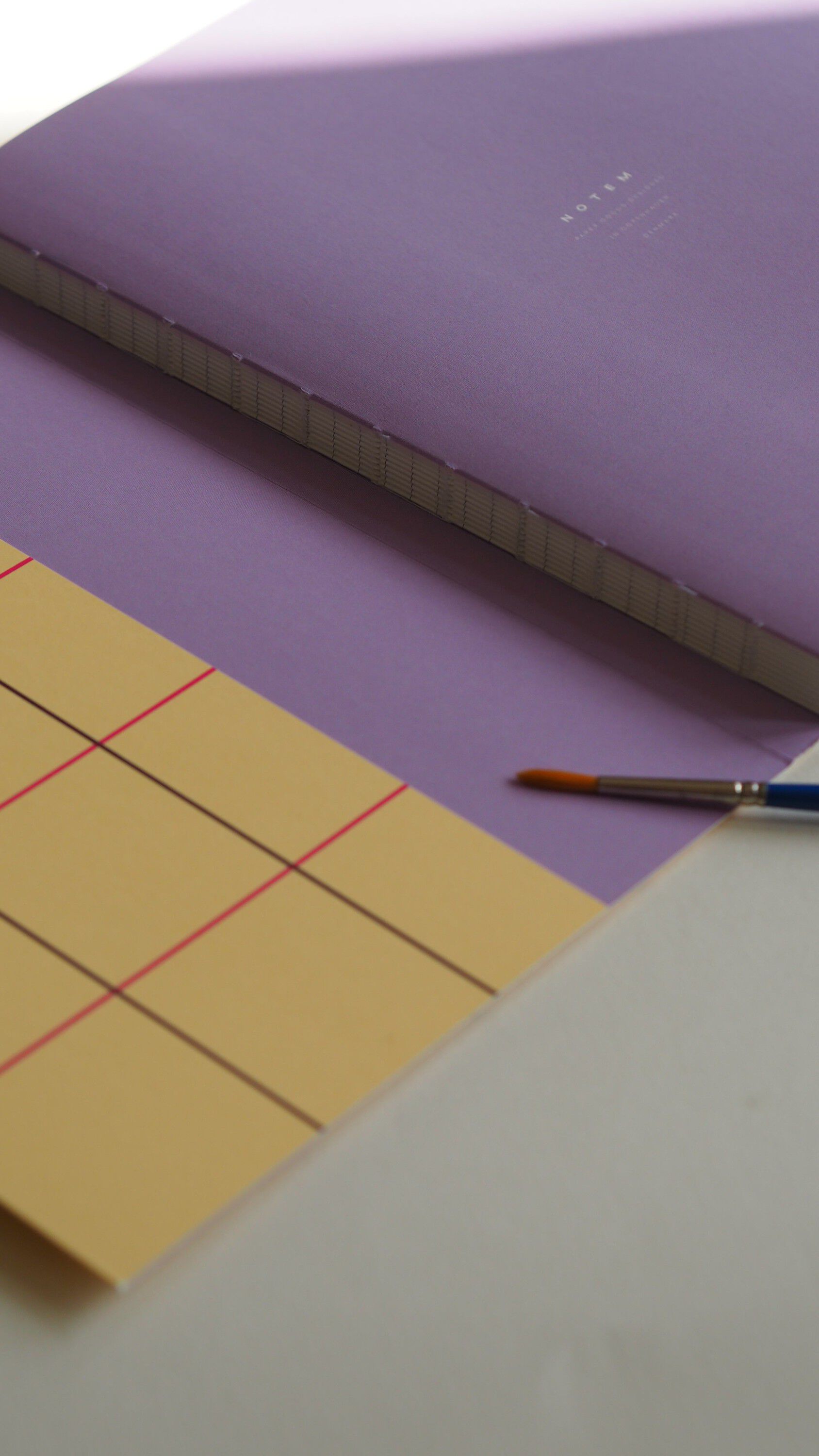UMA notebook, flat lay binding