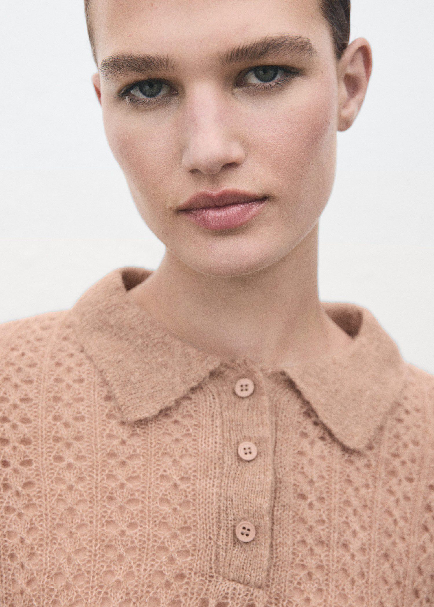 Openwork knitted polo-neck sweater