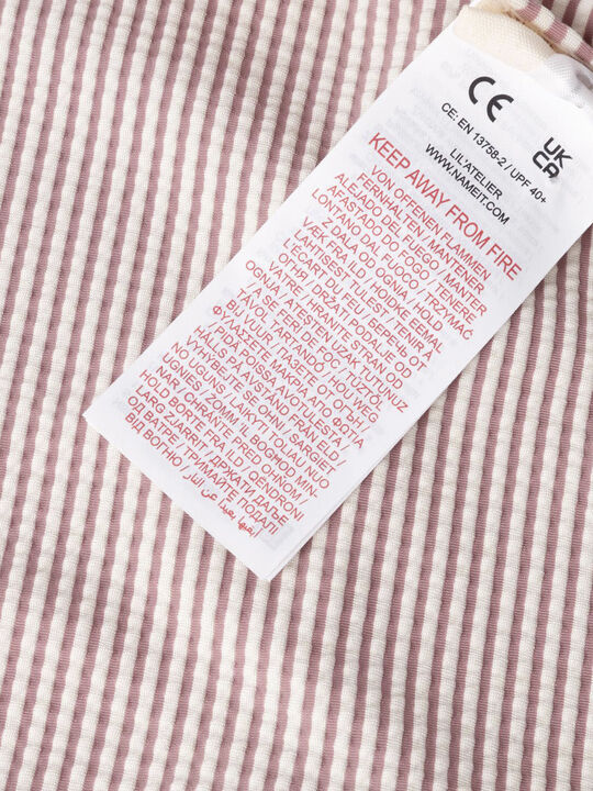 NBFFONDO LS UV LONG SWIMSUIT LIL