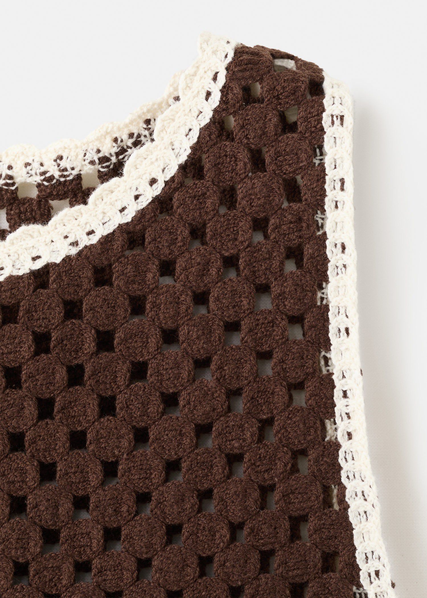 Floral-embroidered crochet top