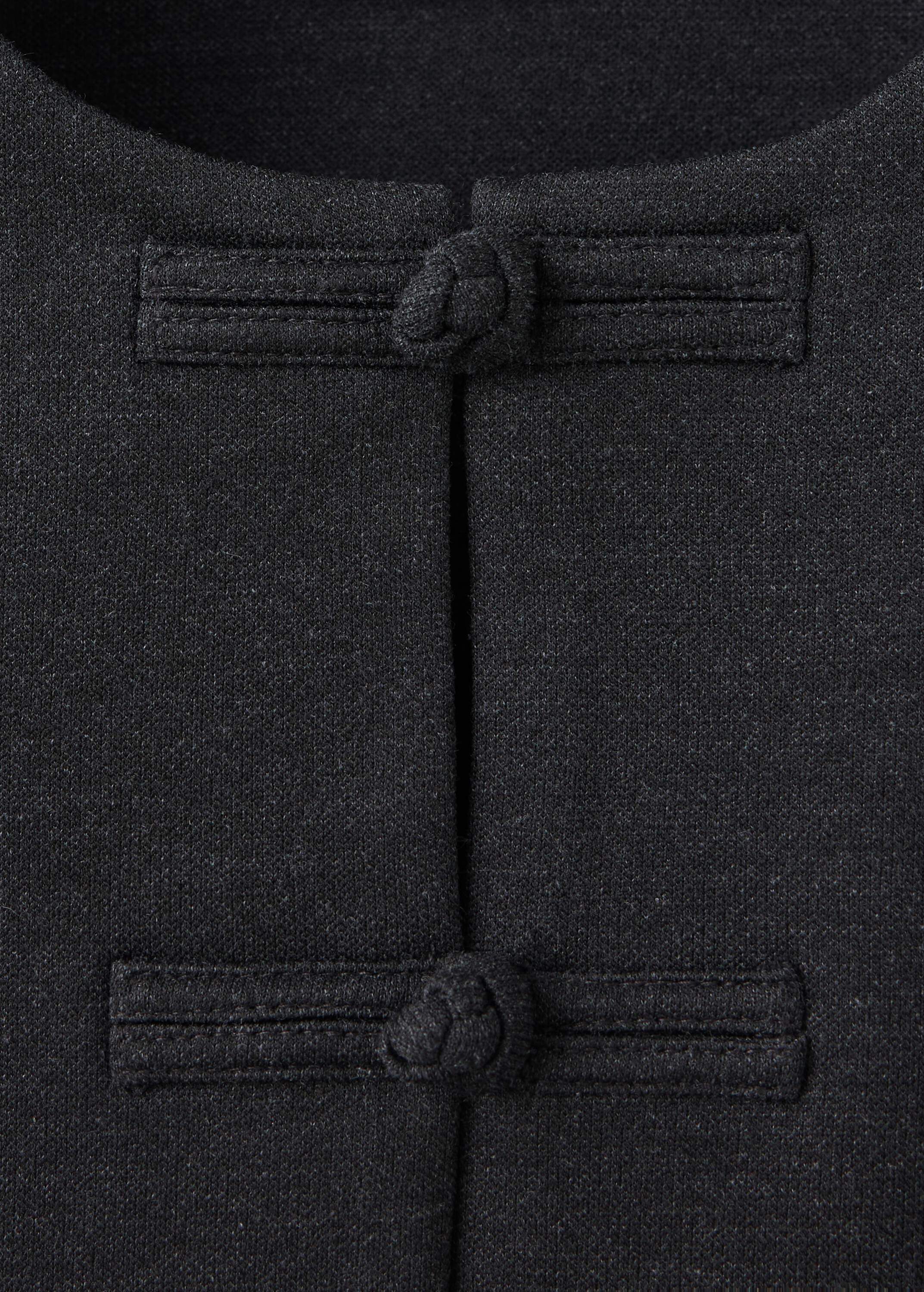 Waistcoat with frogging detail and
