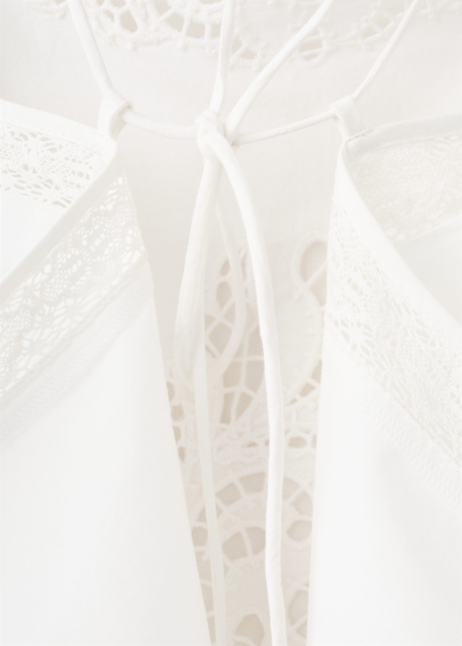 Embroidered top with openwork detai