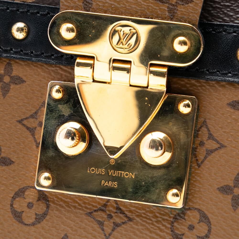 Louis Vuitton Clutch