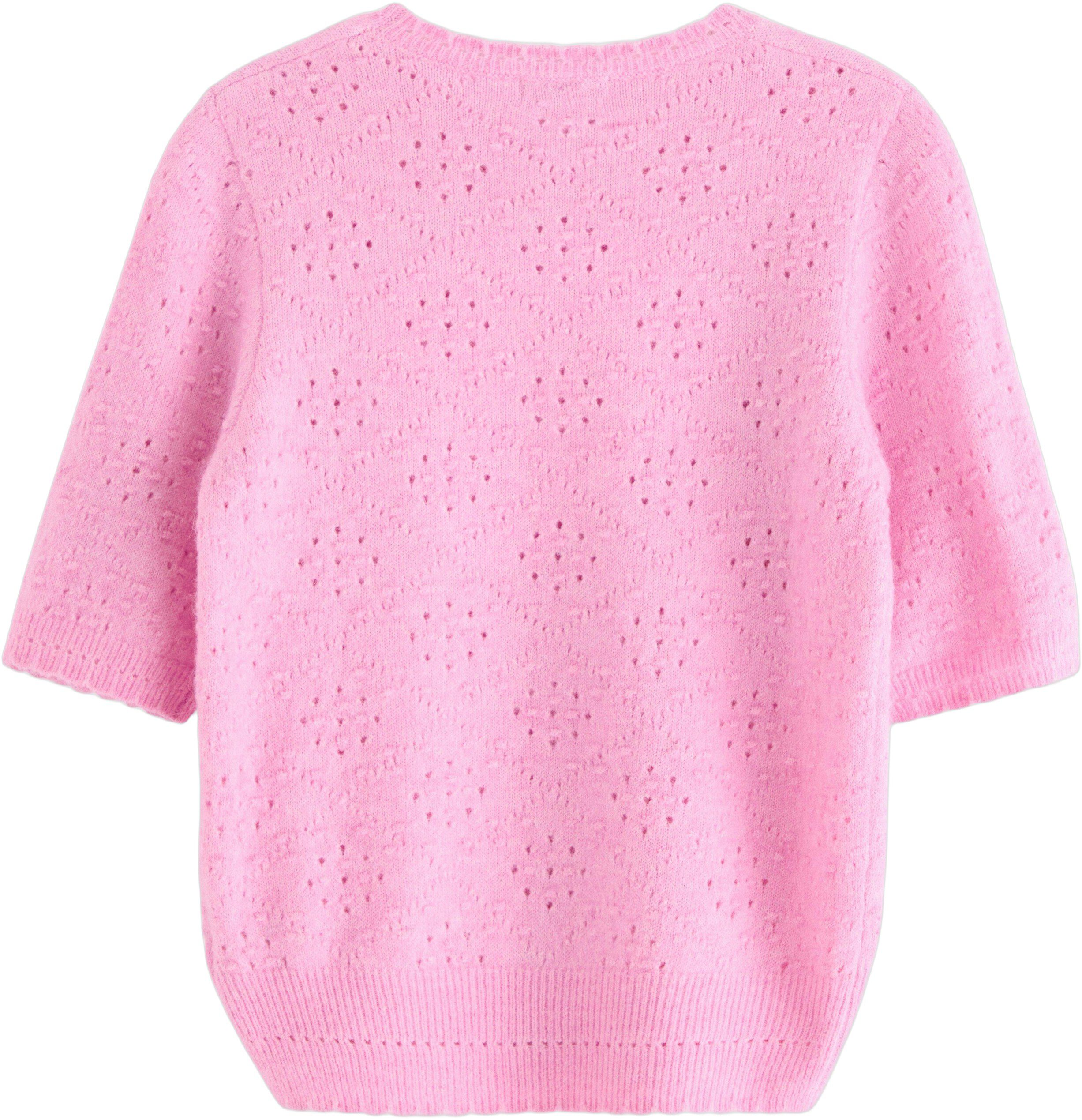 Bl&oslash;d, kort&aelig;rmet tr&oslash;je med et hel