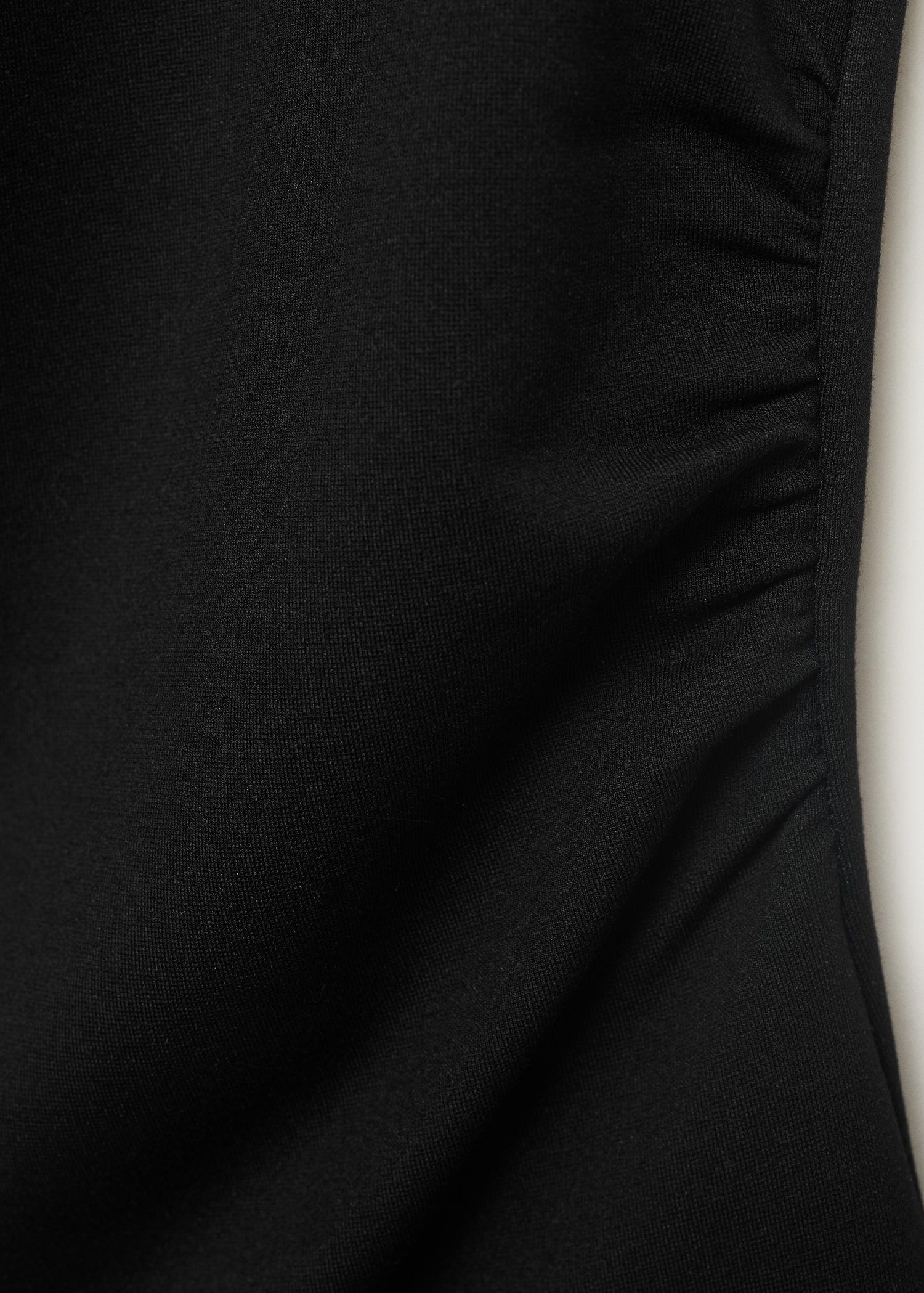 Asymmetrical draped top