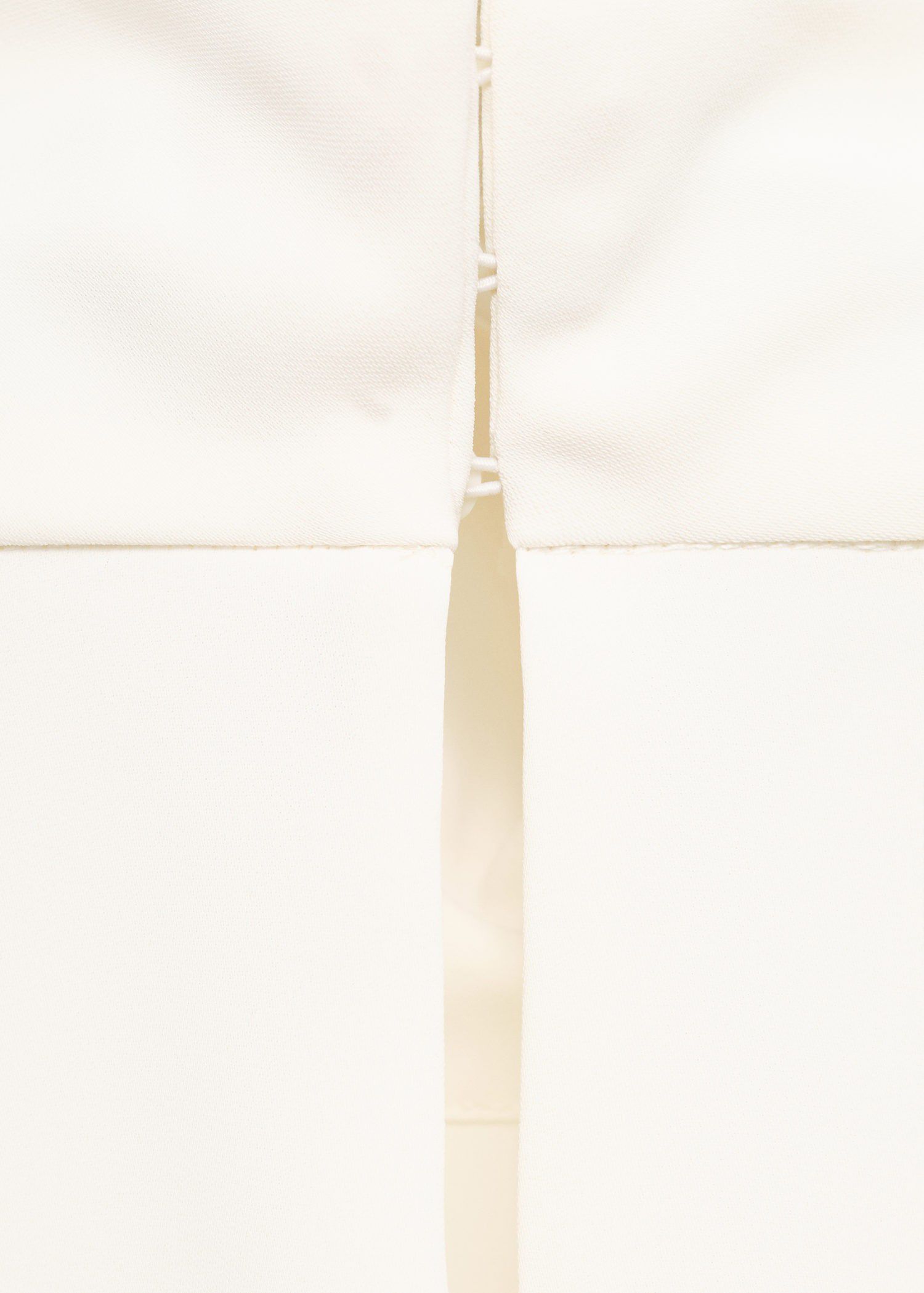 High-neck blouse with asymmetrical