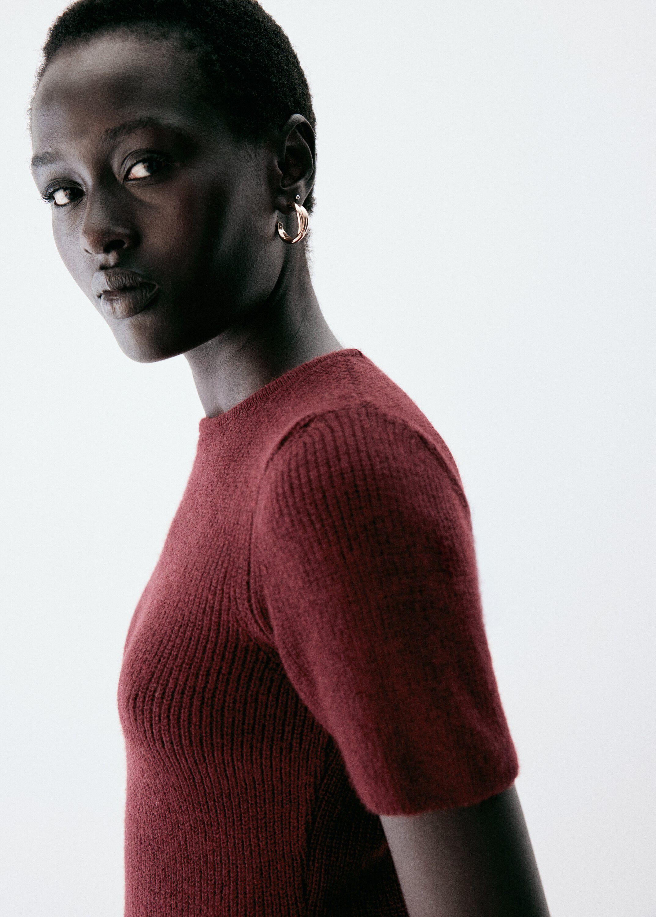 Ribbed peplum sweater