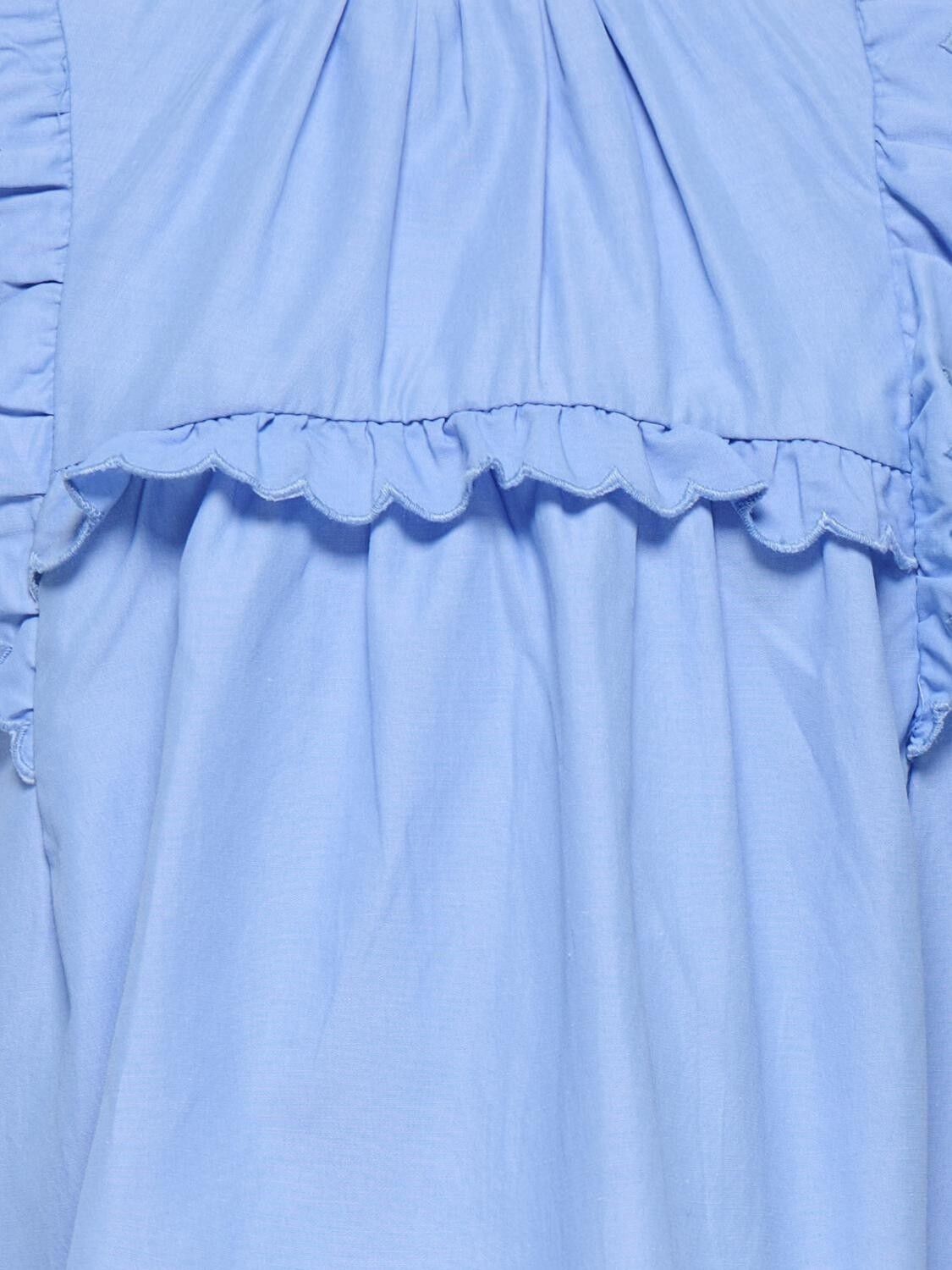 KMGCLARE SS RUFFLE TOP WVN