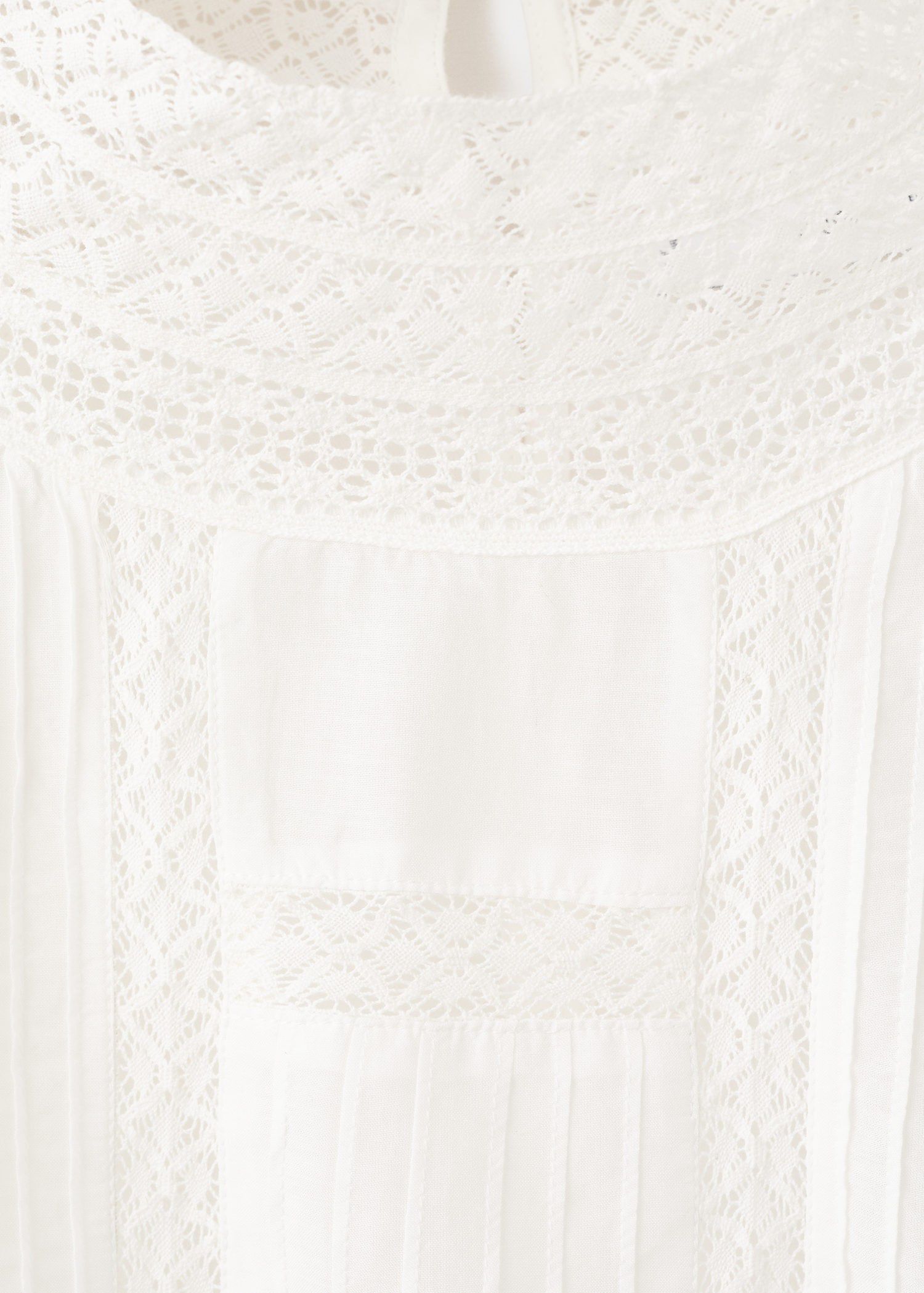 Embroidered openwork blouse