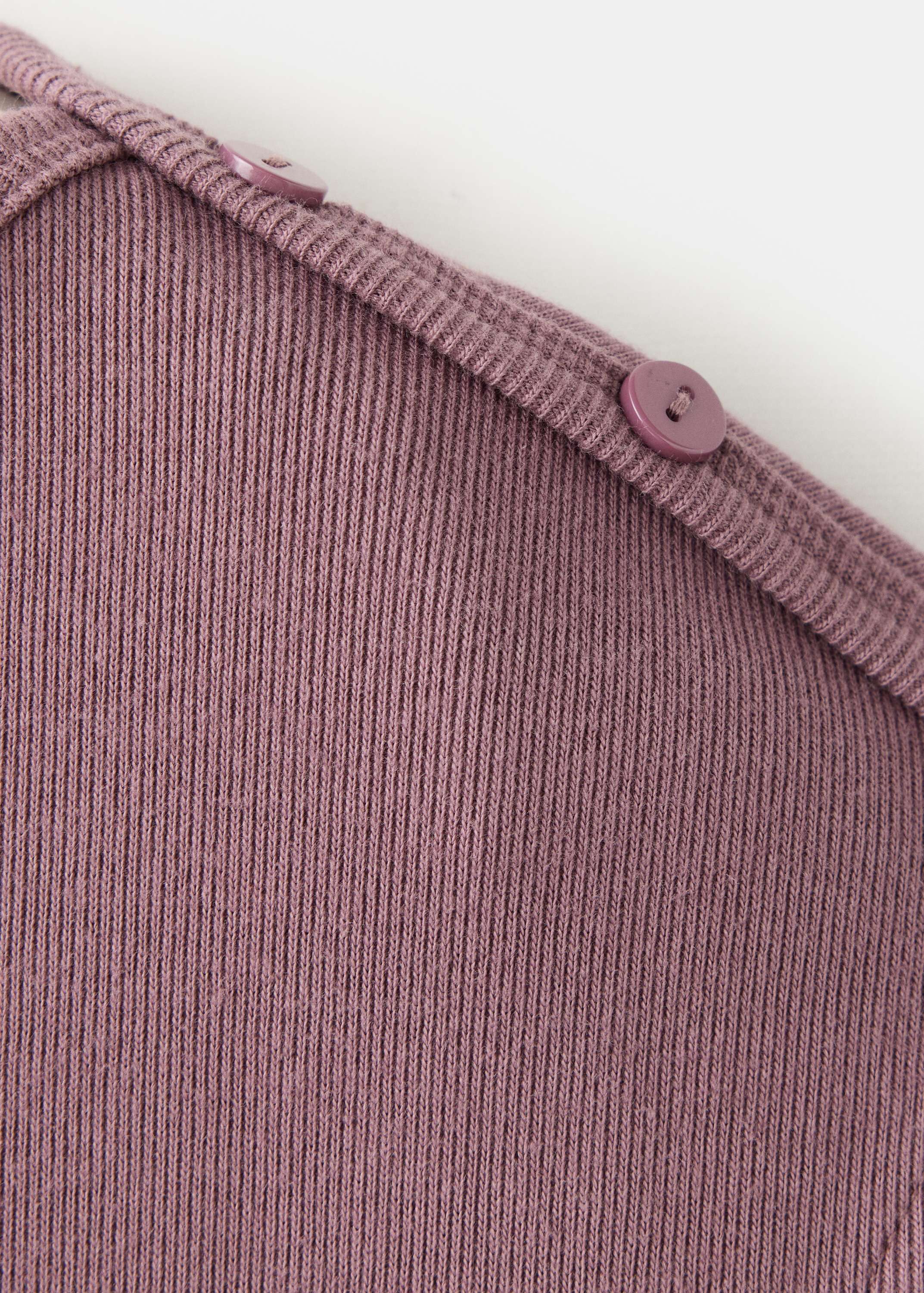 Boat neck top with decorative butto