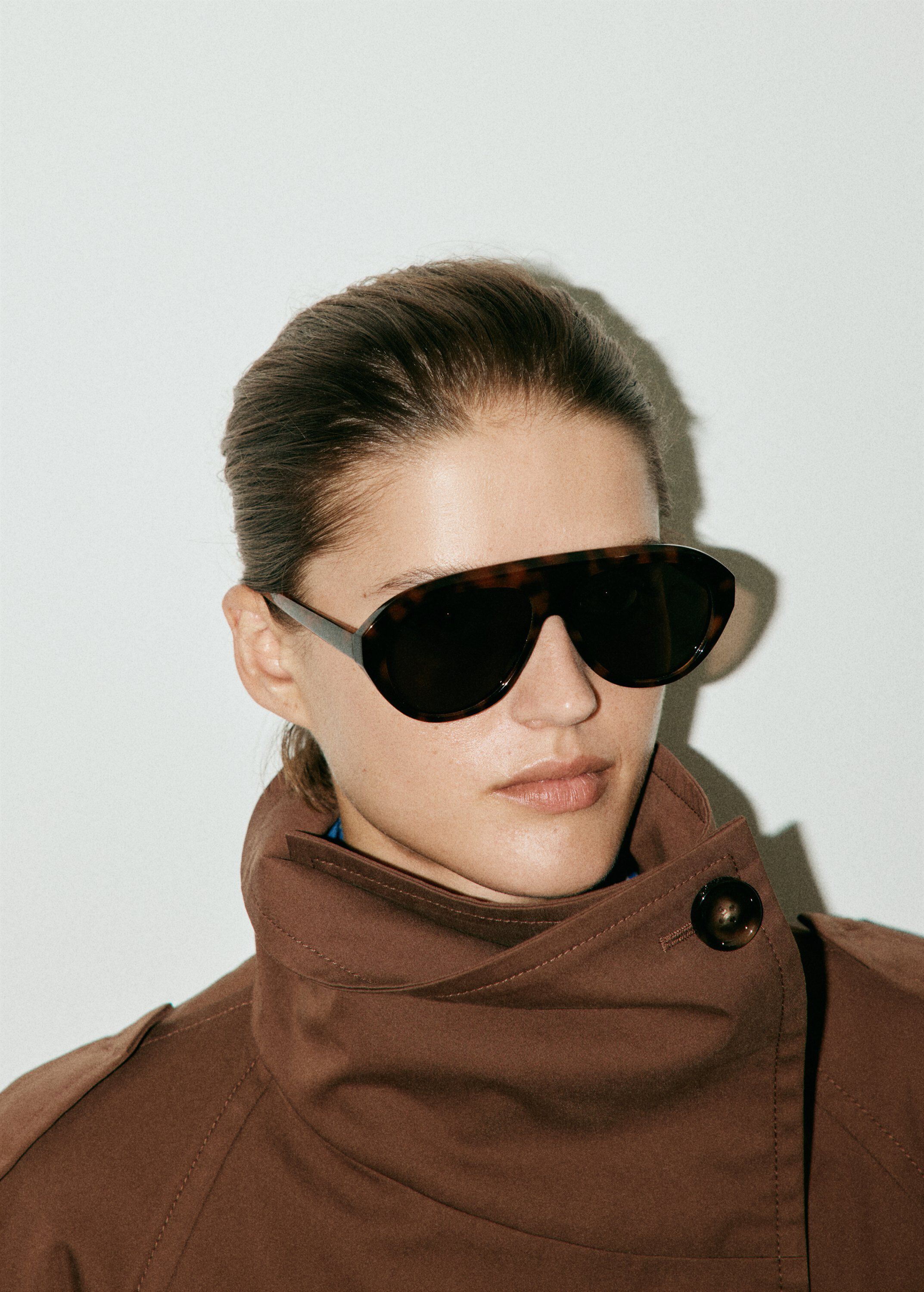 Double-breasted cropped trench coat