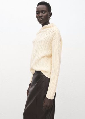 Asymmetrical cable knit sweater