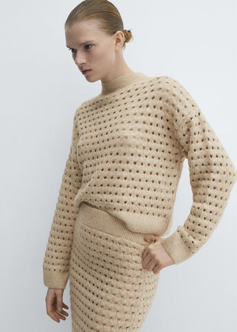Knitted sweater with openwork detai
