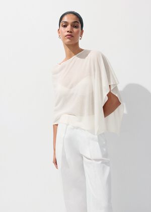 Asymmetrical knitted cape
