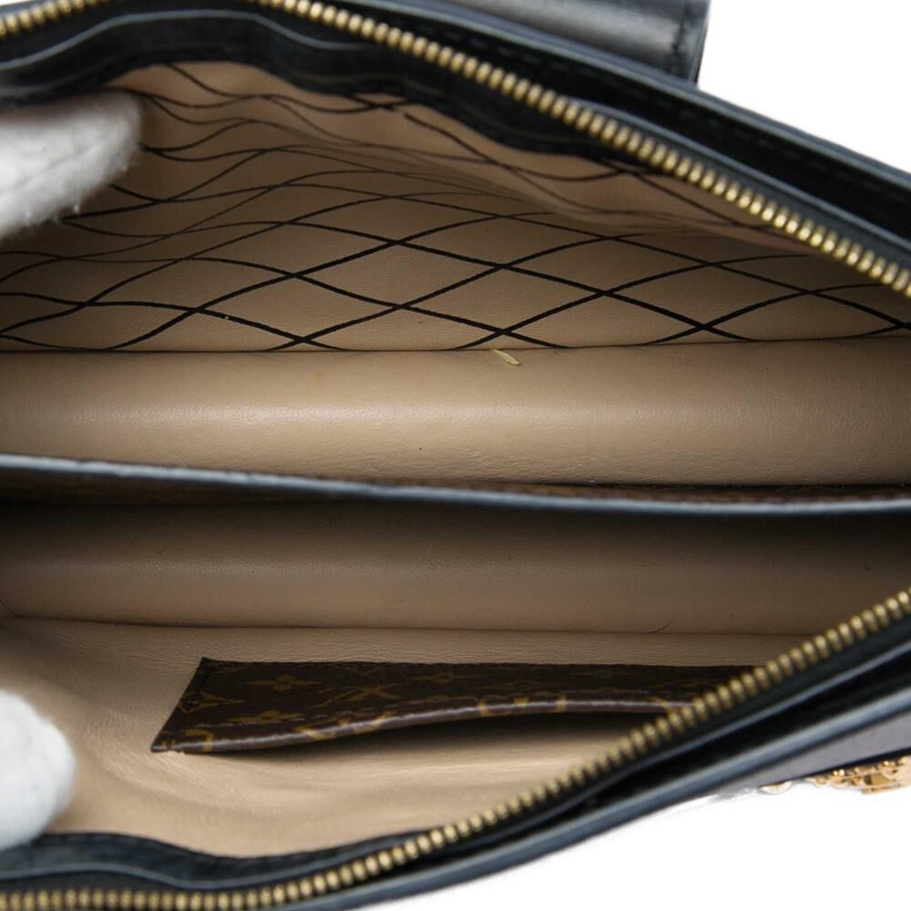Louis Vuitton Clutch