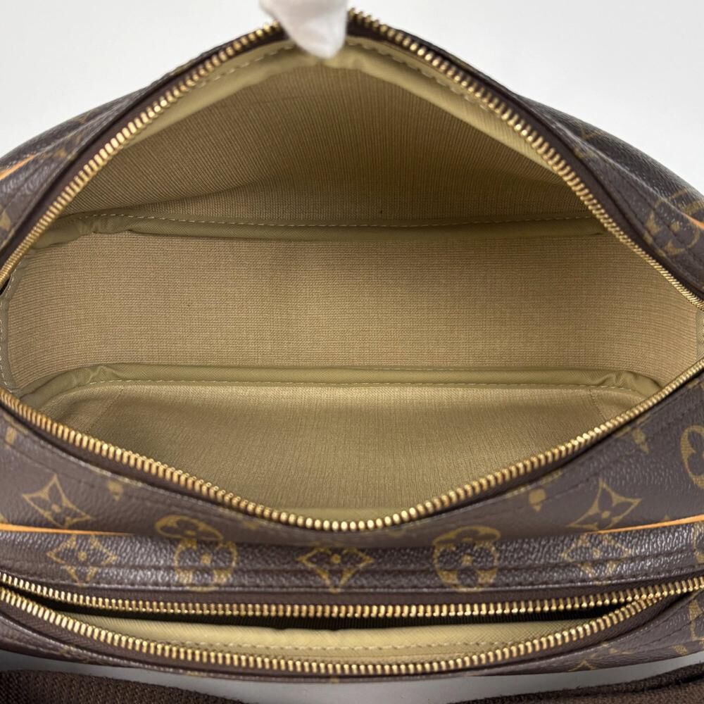 Louis Vuitton Reporter