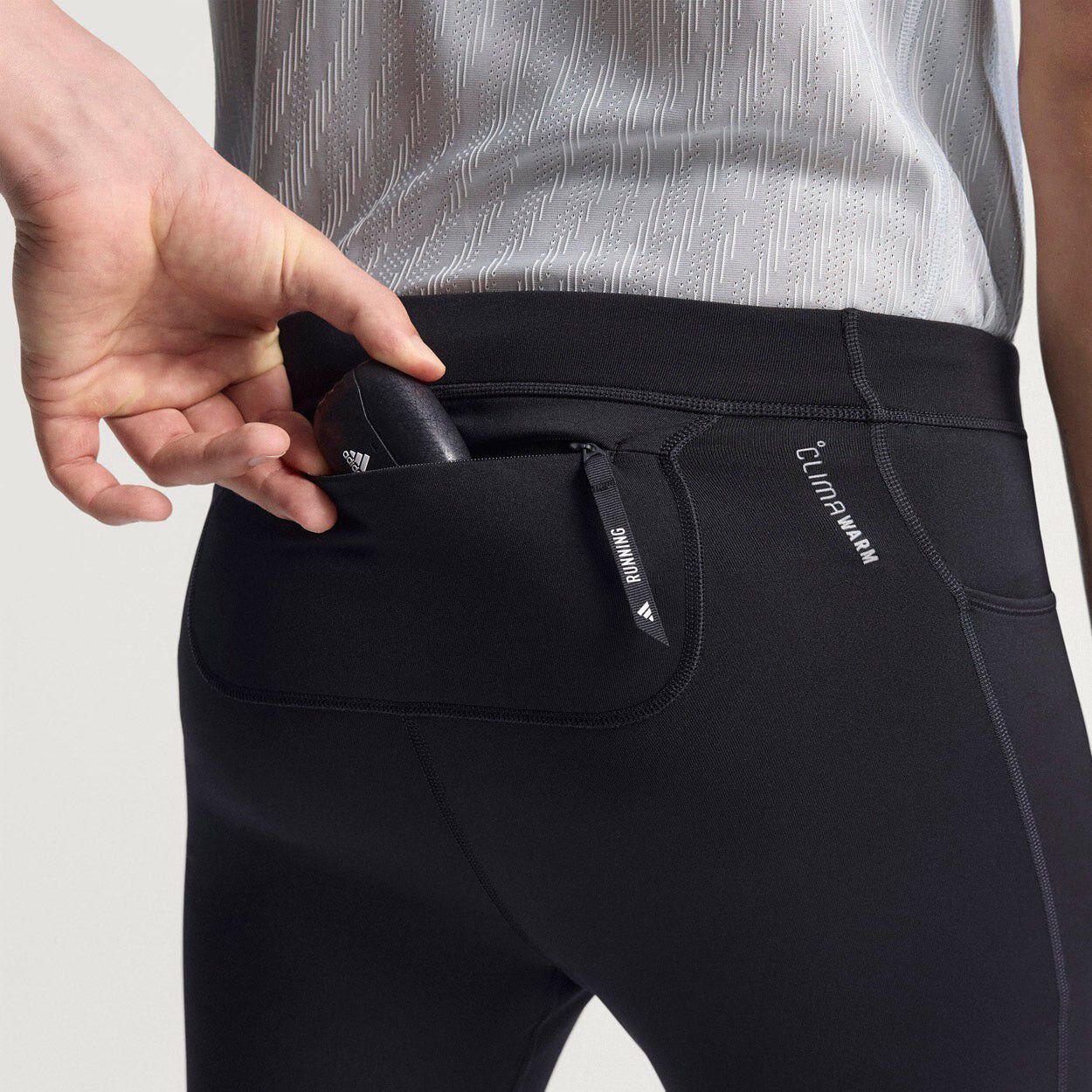 Own The Run Vindstopper Tights