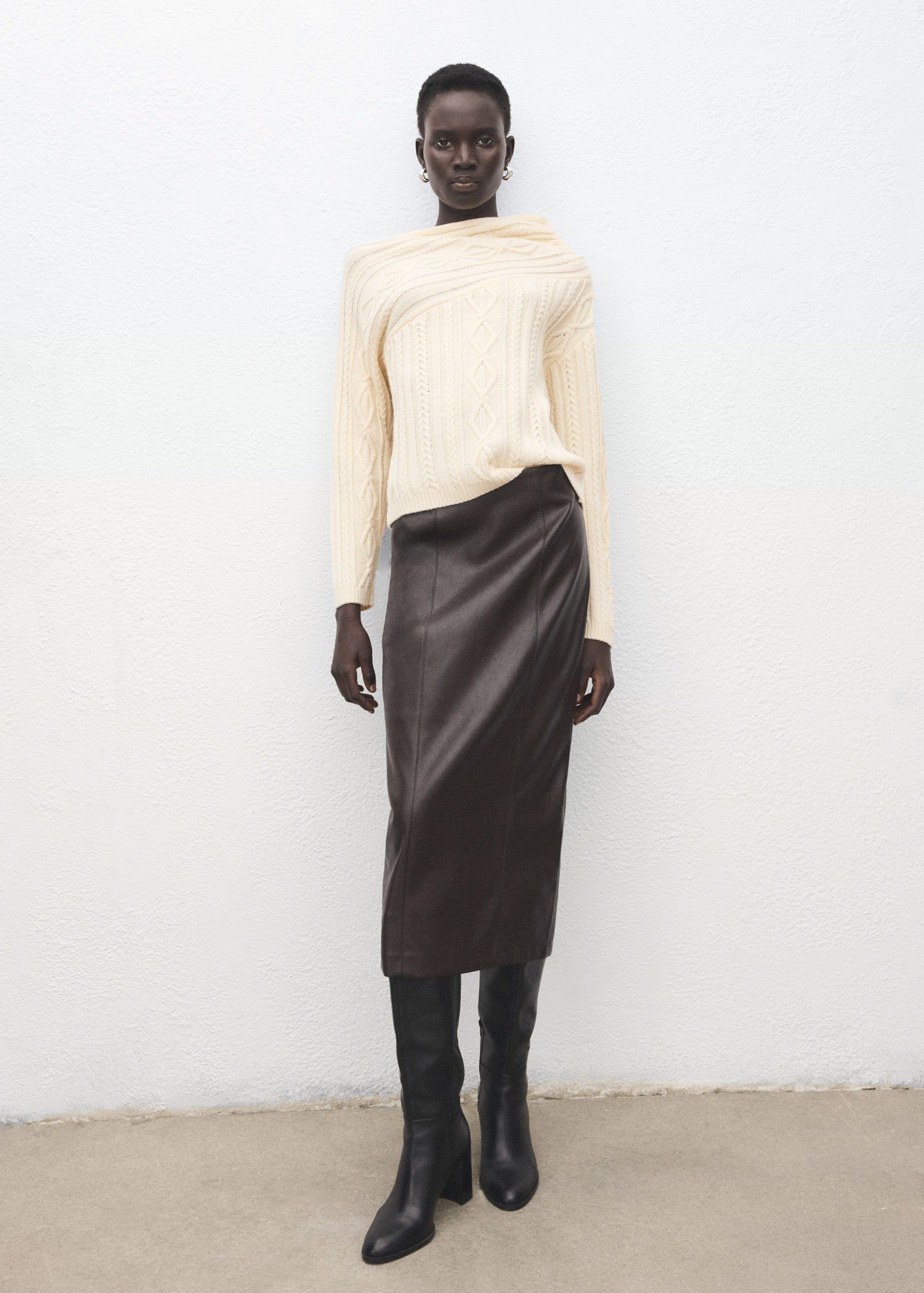 Asymmetrical cable knit sweater