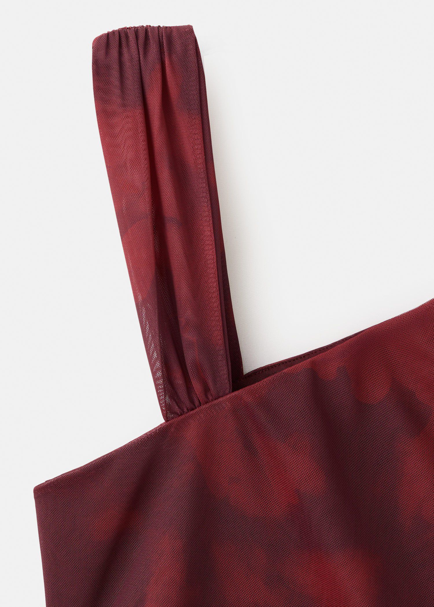 Asymmetric printed top