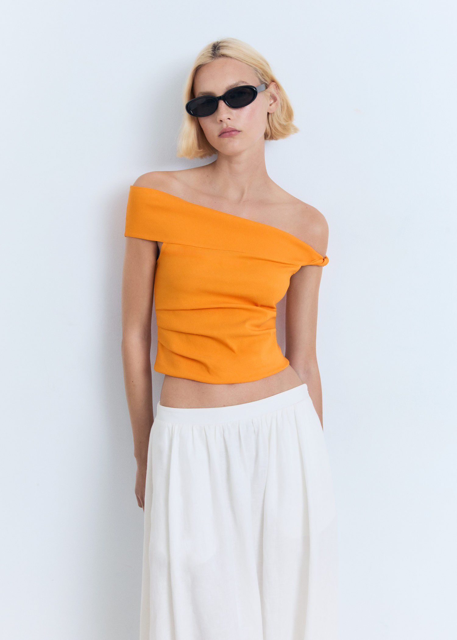 Asymmetrical strapless top