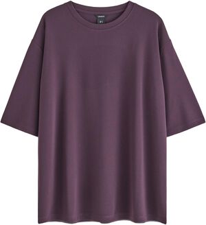 Stilsäker oversized topp med korta