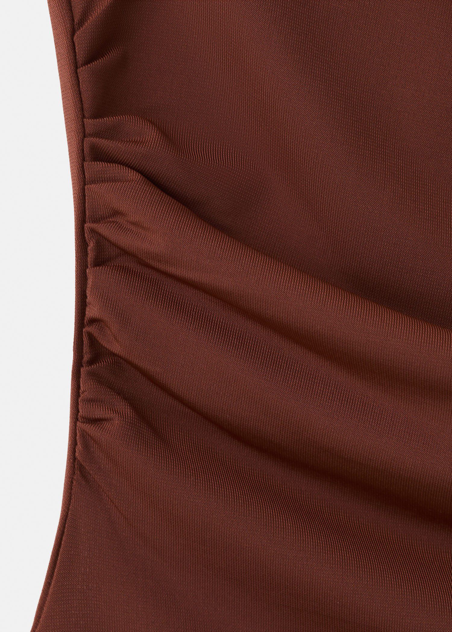 Asymmetric appliqu&eacute; top