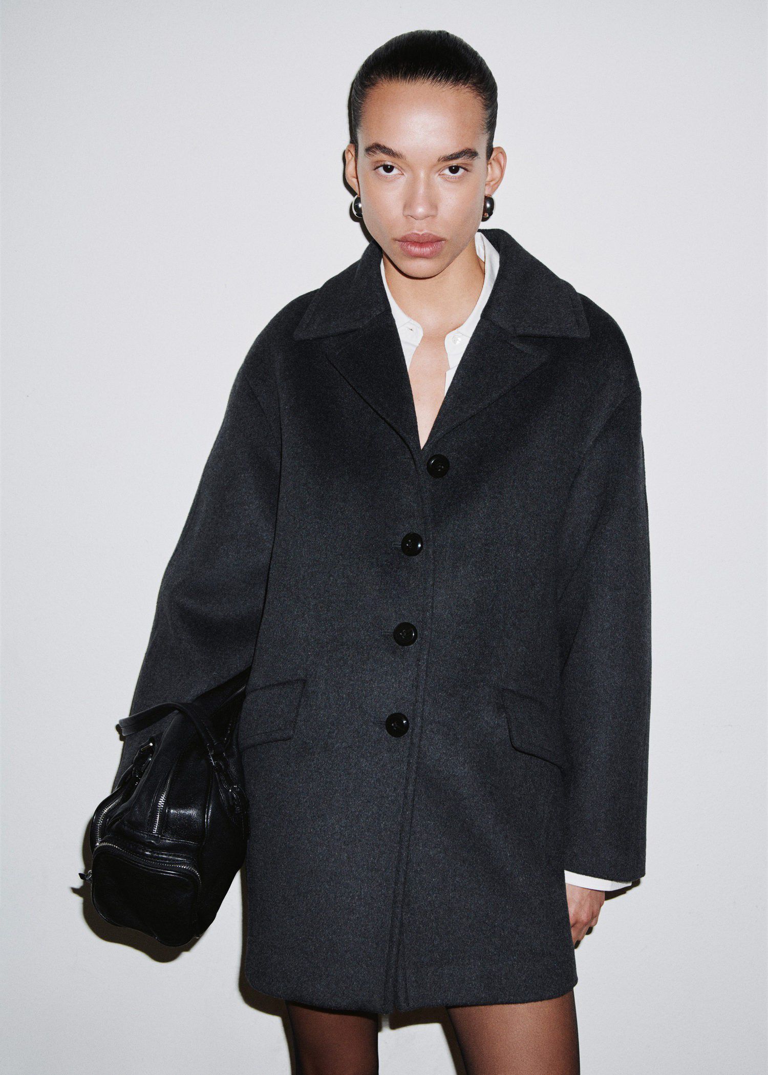 Wool-blend coat with button fasteni
