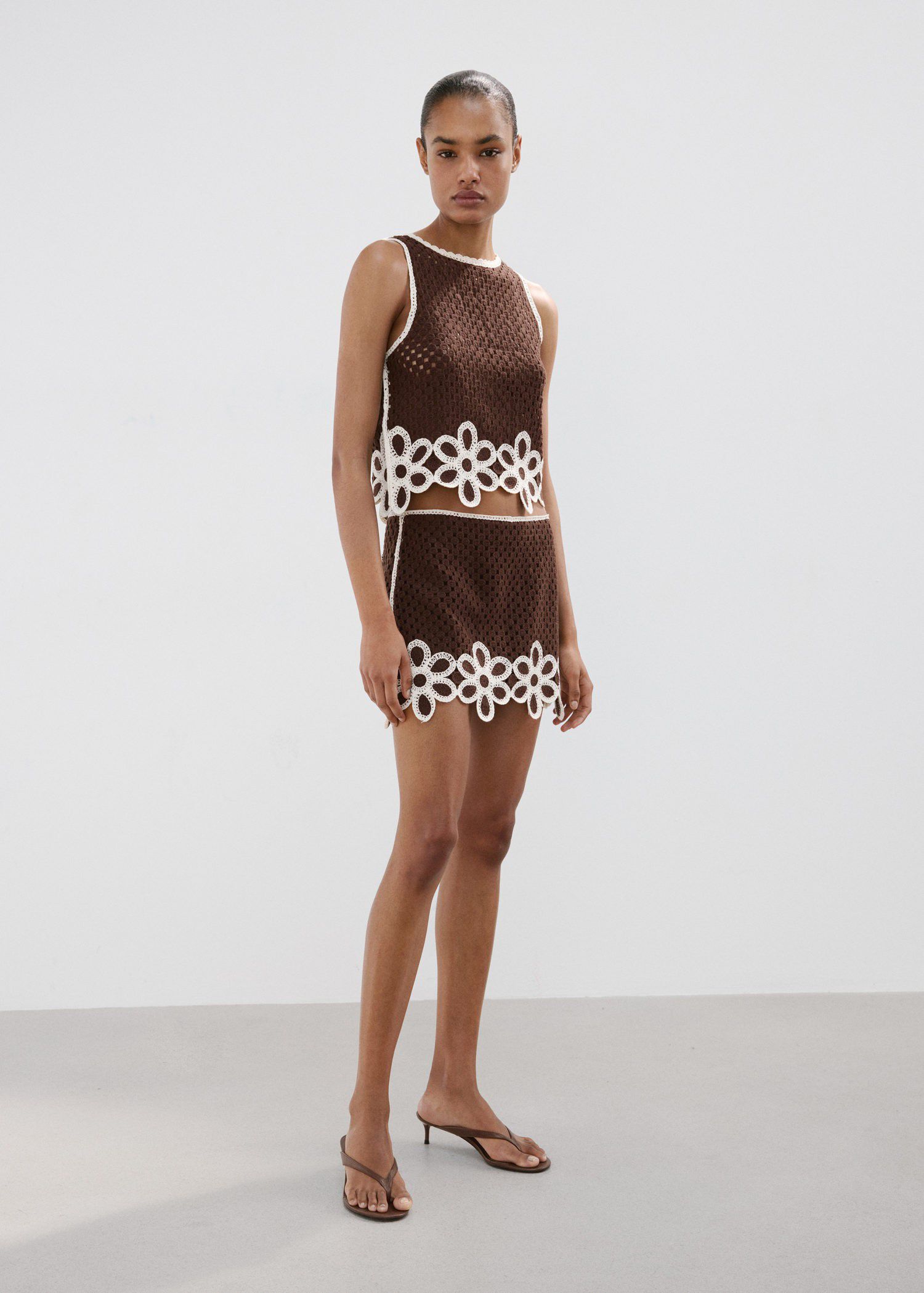 Floral-embroidered crochet top