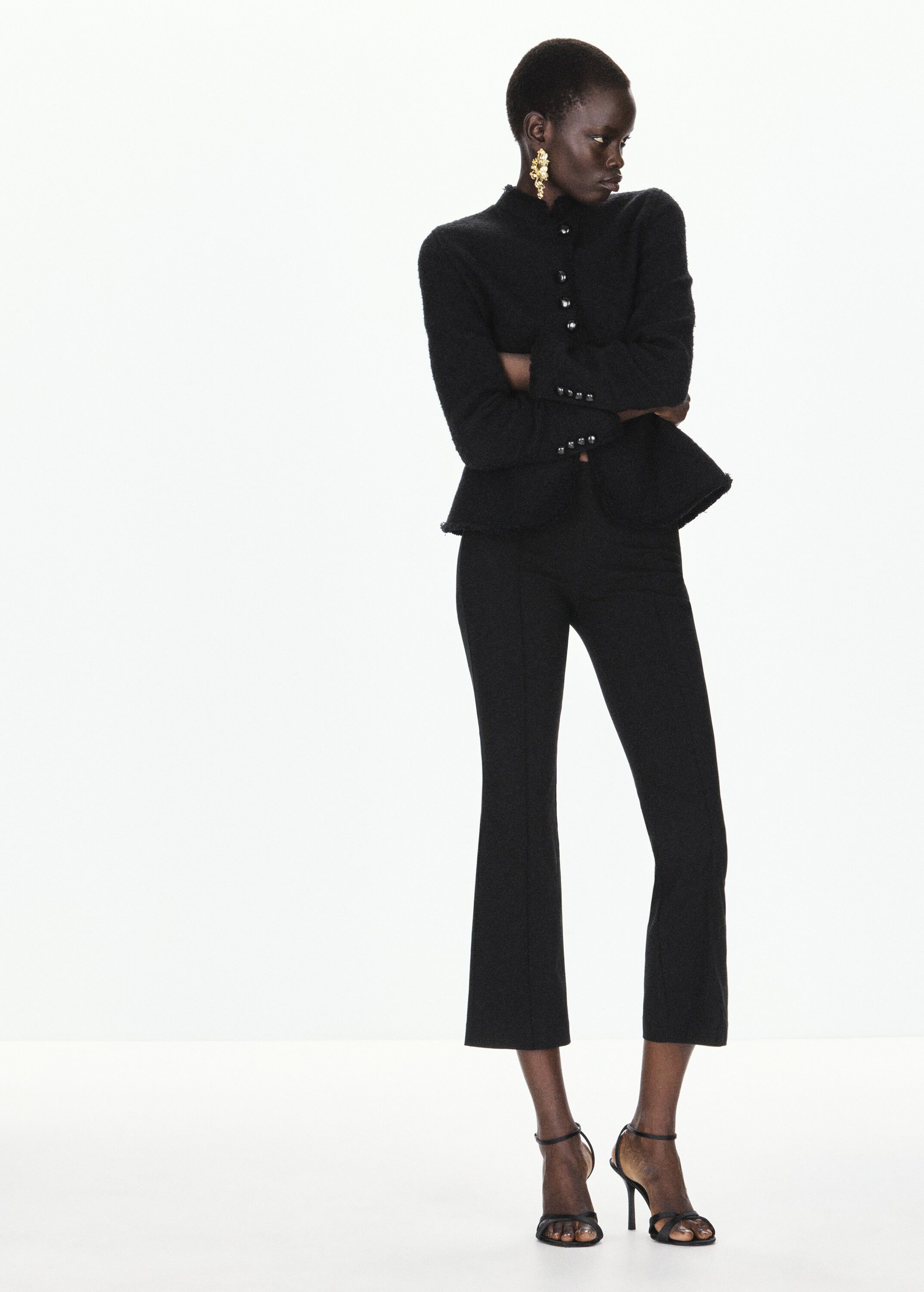 Jacket with jewel-button strip coll