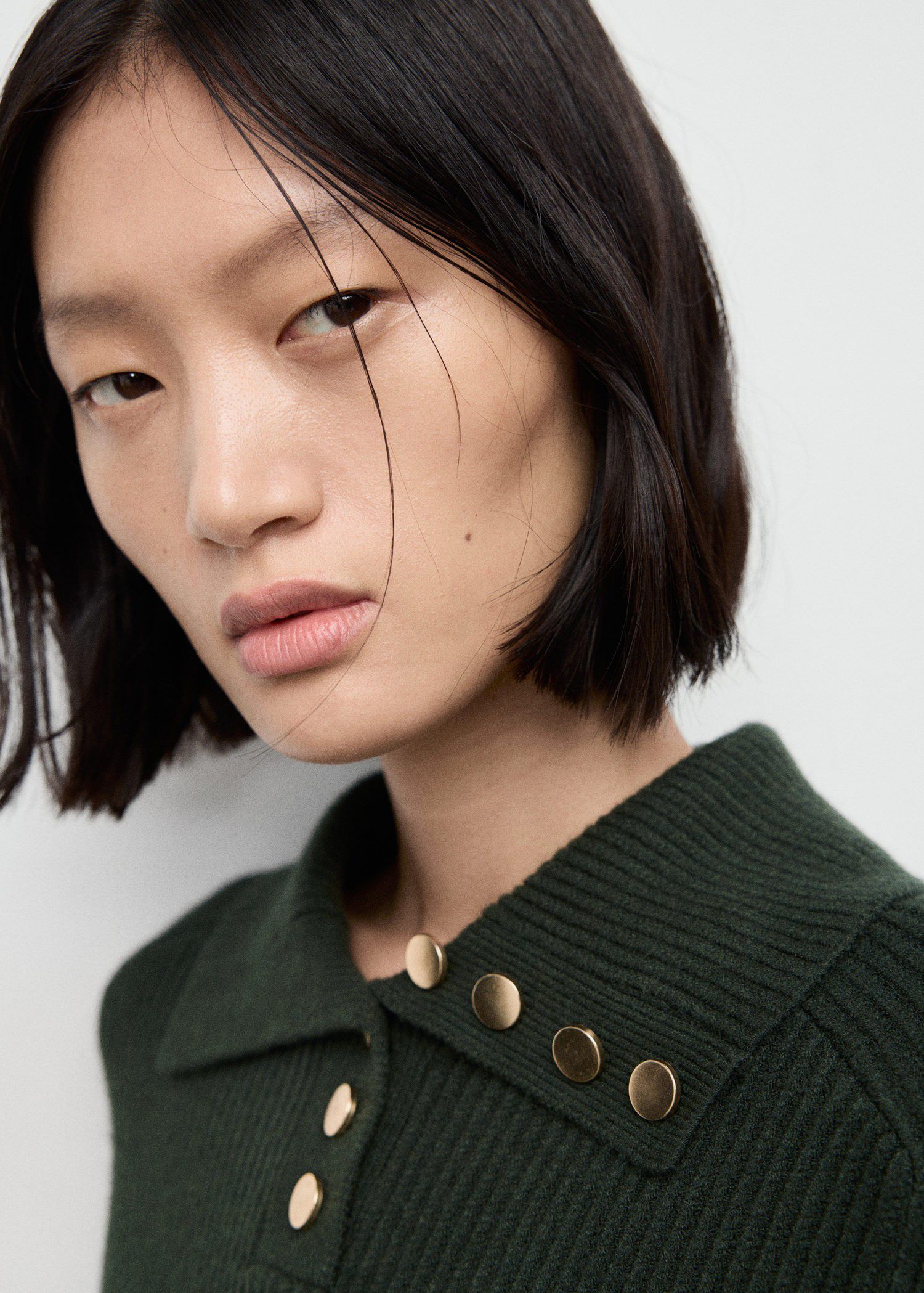 Ribbed polo-neck sweater with butto