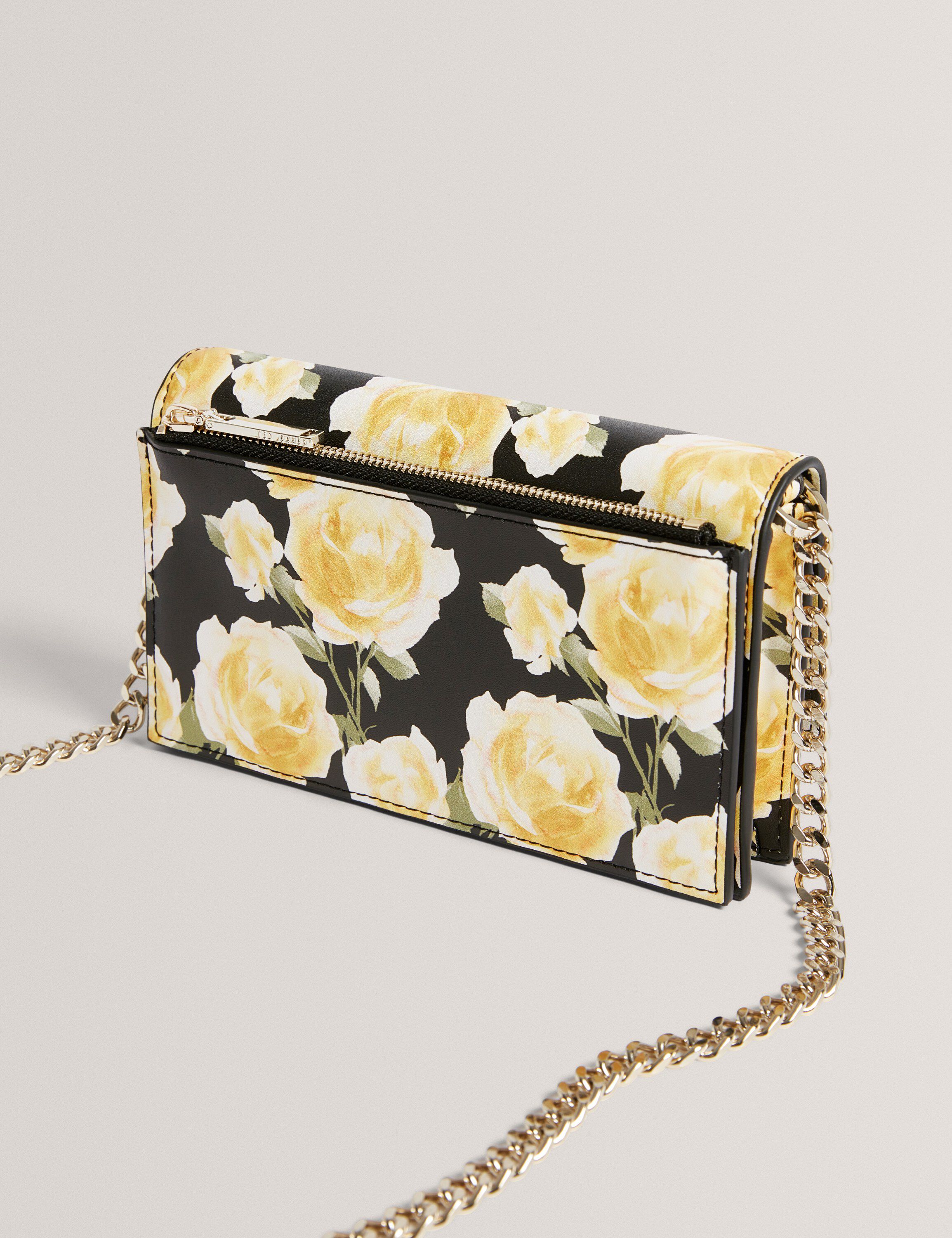 MAHIRYA Printed Lock Purse on a Cha
