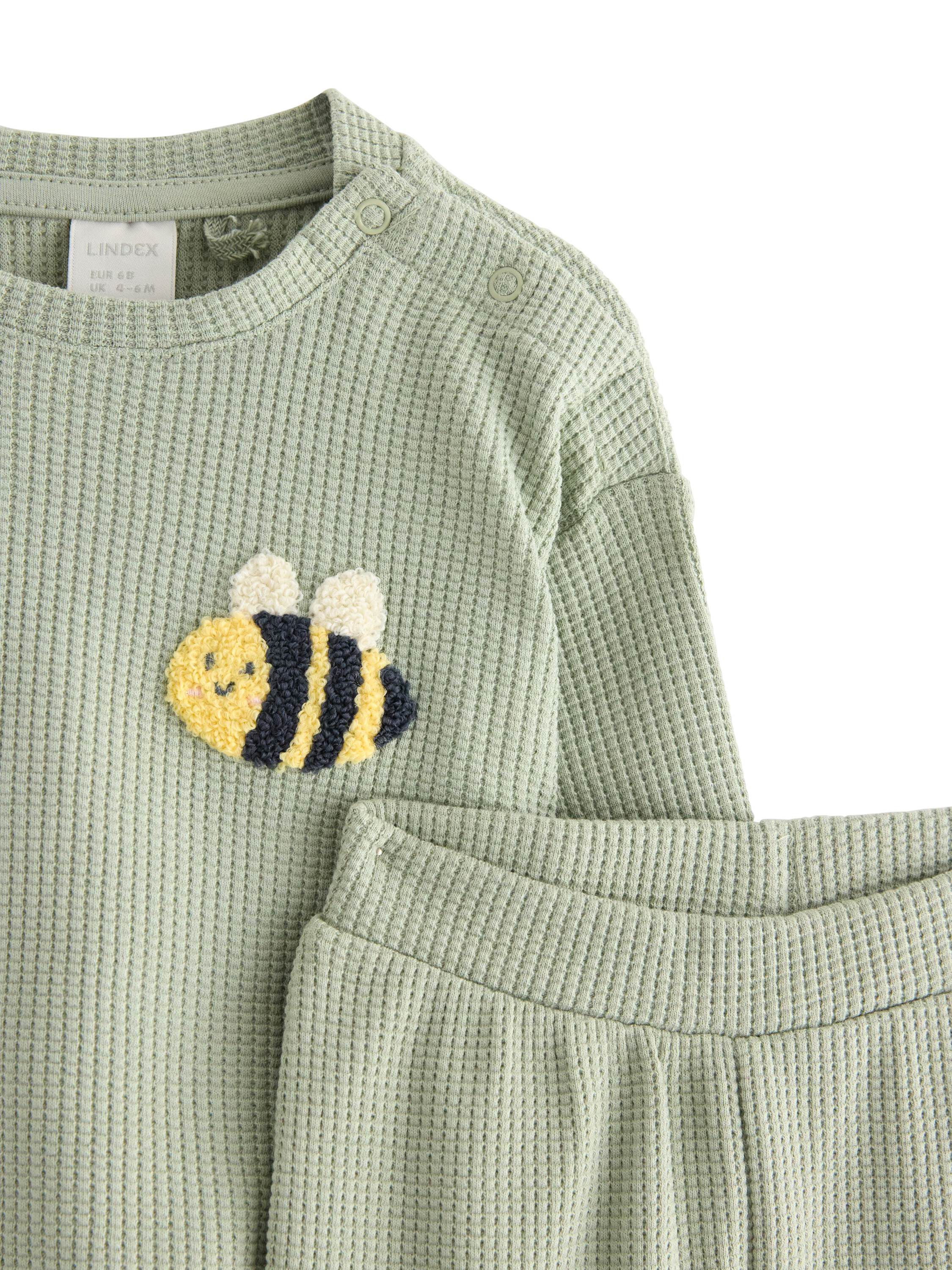 Mjukt set i v&aring;fflad bomull med en s