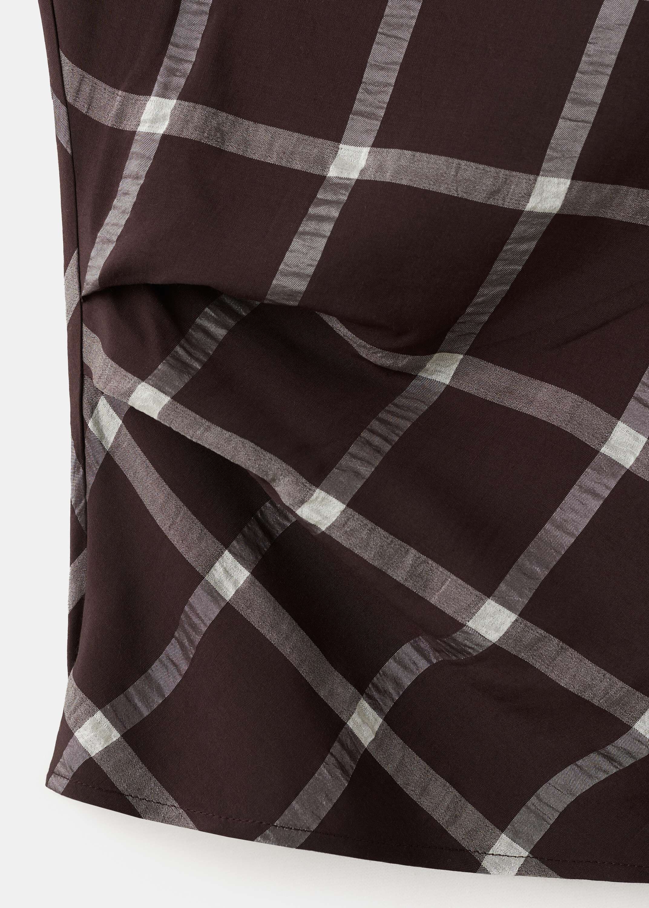 Fitted top with draped neckline