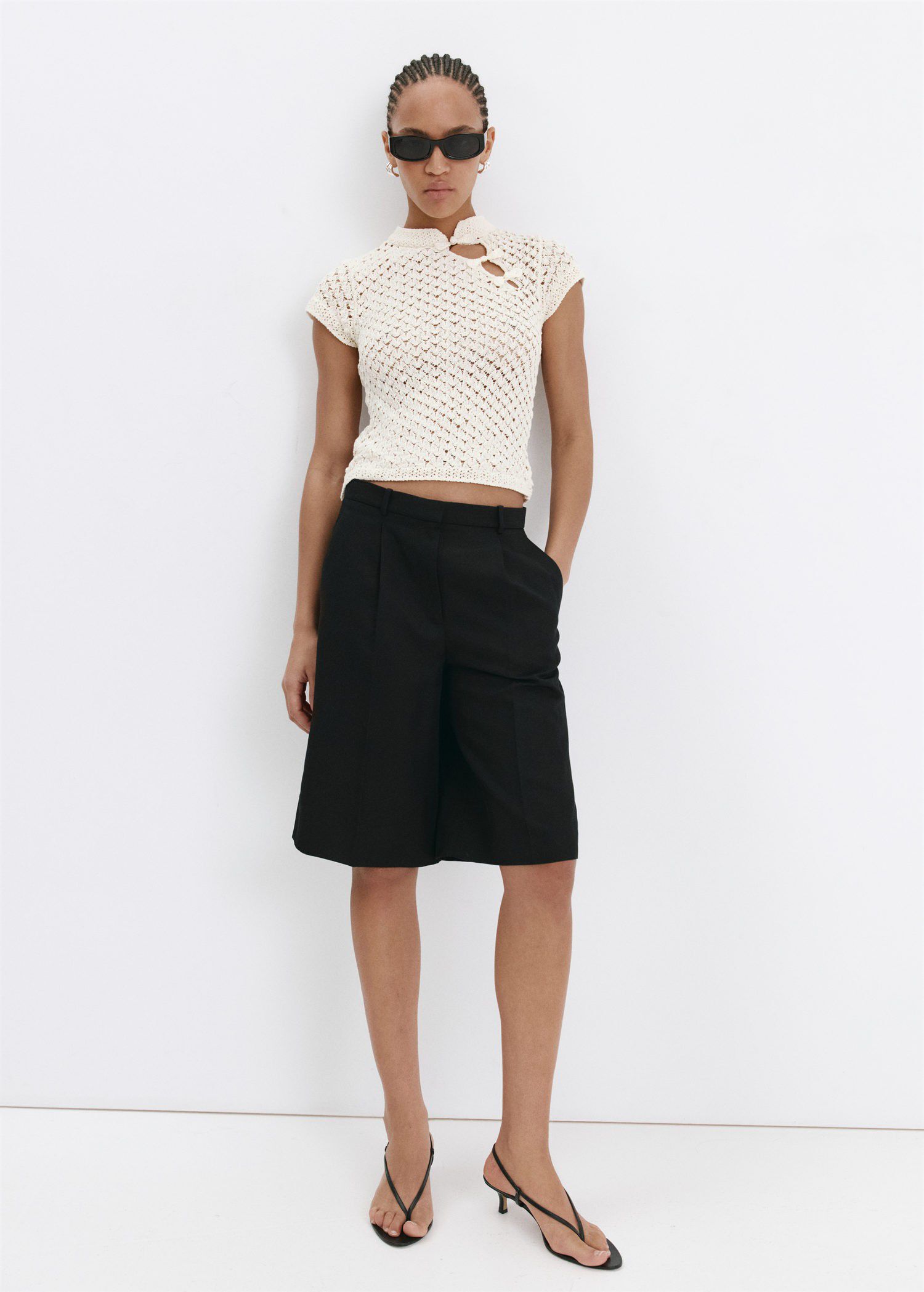 Openwork knit sweater with toggle c