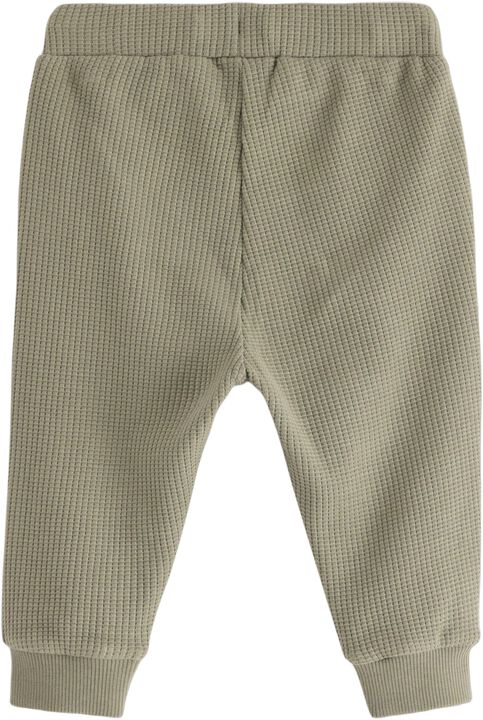 Joggers in waffled cotton with appl