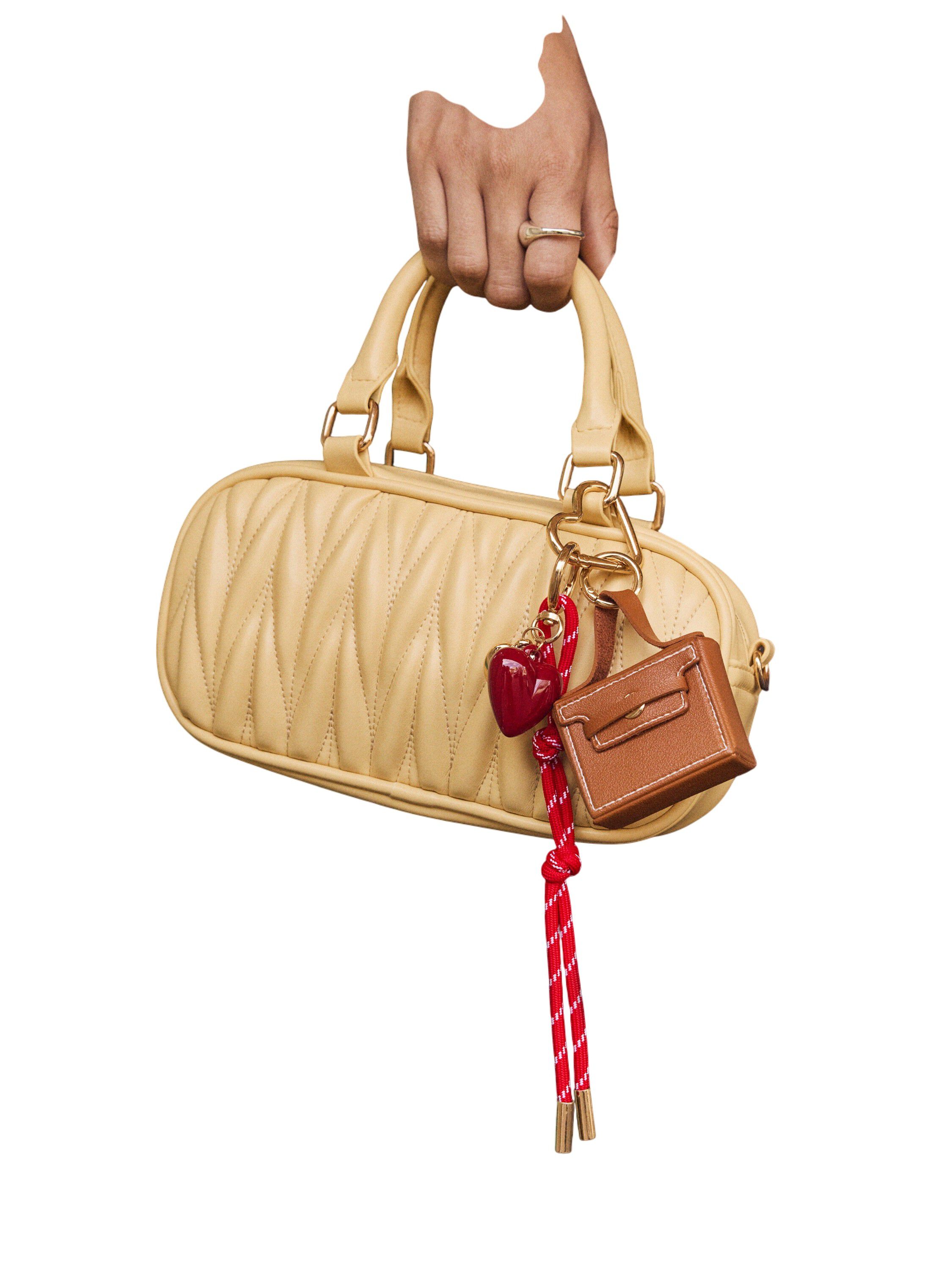 Small shoulder bag in imitation lea