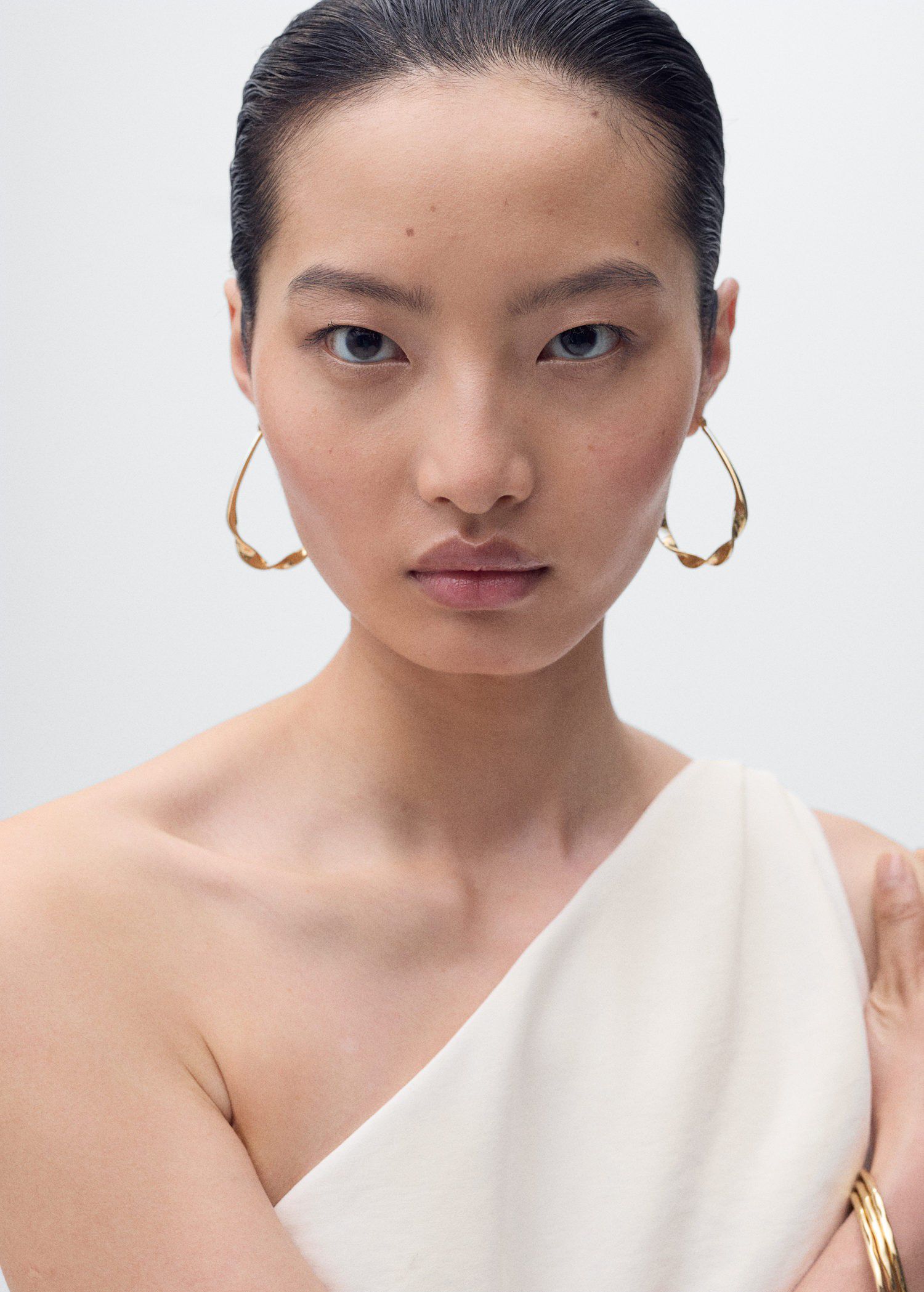 Long jumpsuit with asymmetrical nec