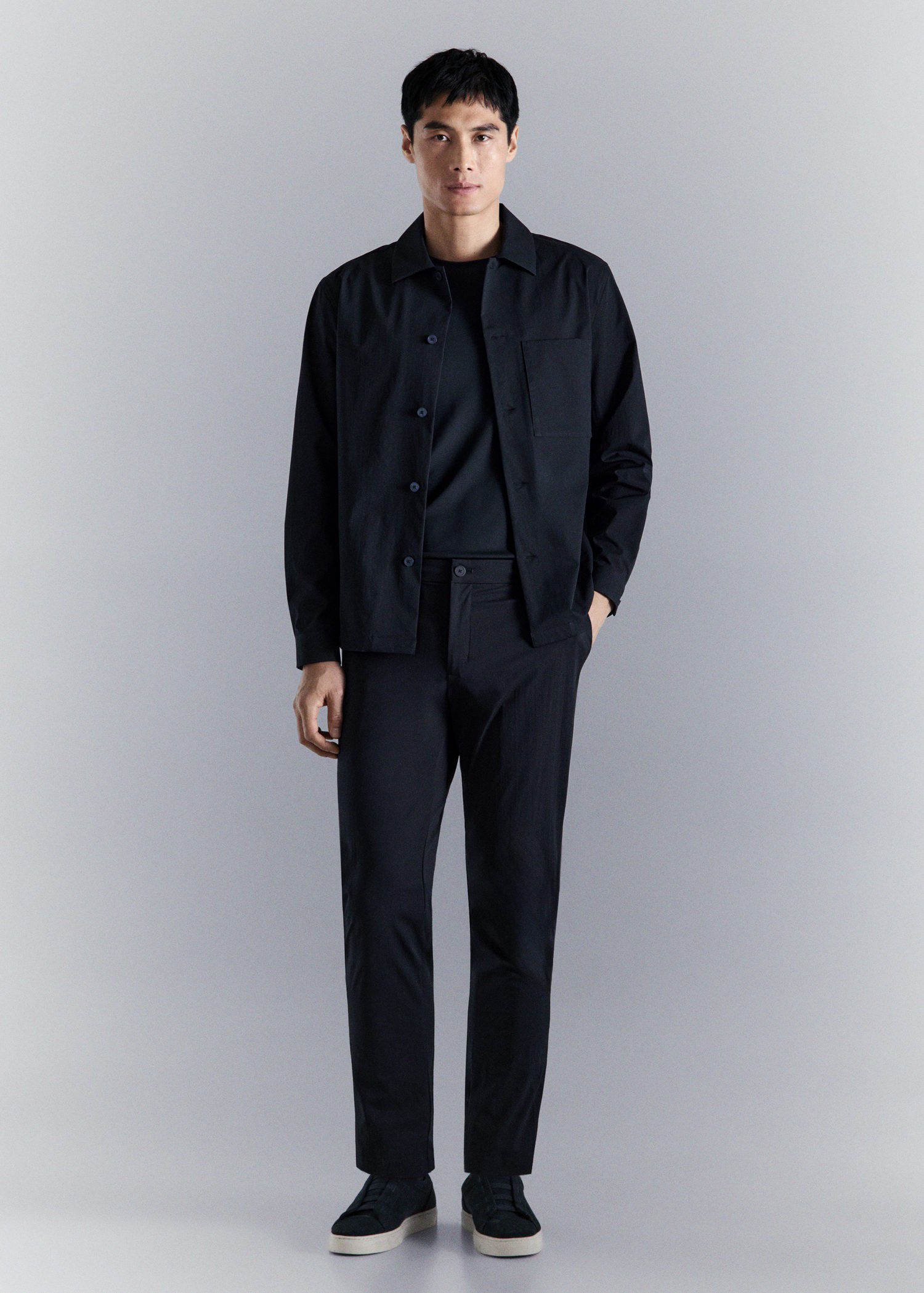 Stretch fabric slim-fit trousers wi