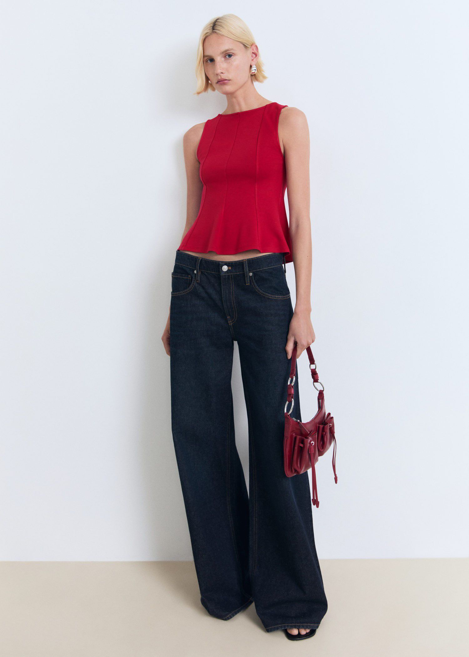 Peplum top with seam detail